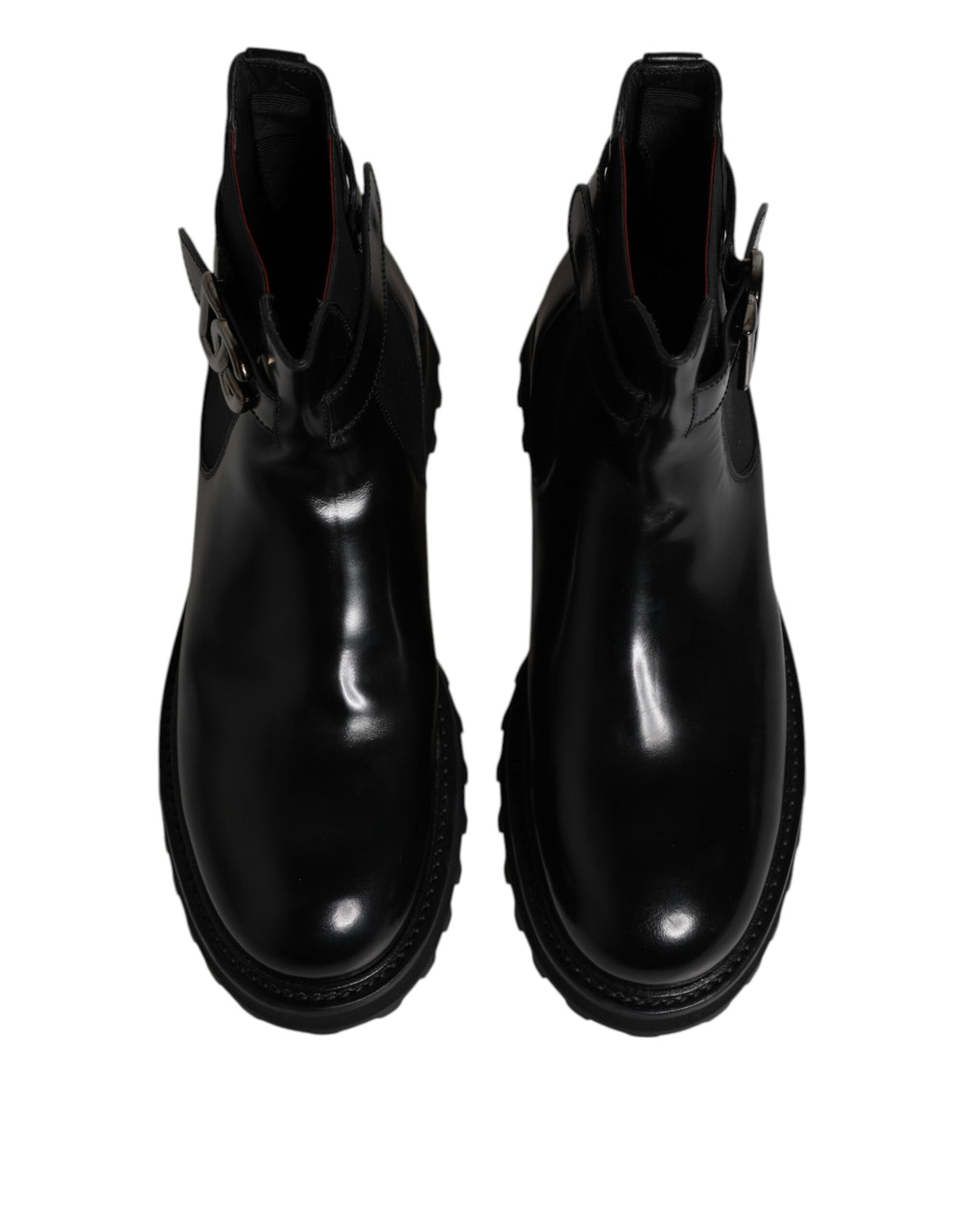 Step into unparalleled elegance with Dolce & Gabbana's Black Belted DG Logo Chelsea Boots, crafted from luxurious calf leather for a timeless, sophisticated allure.