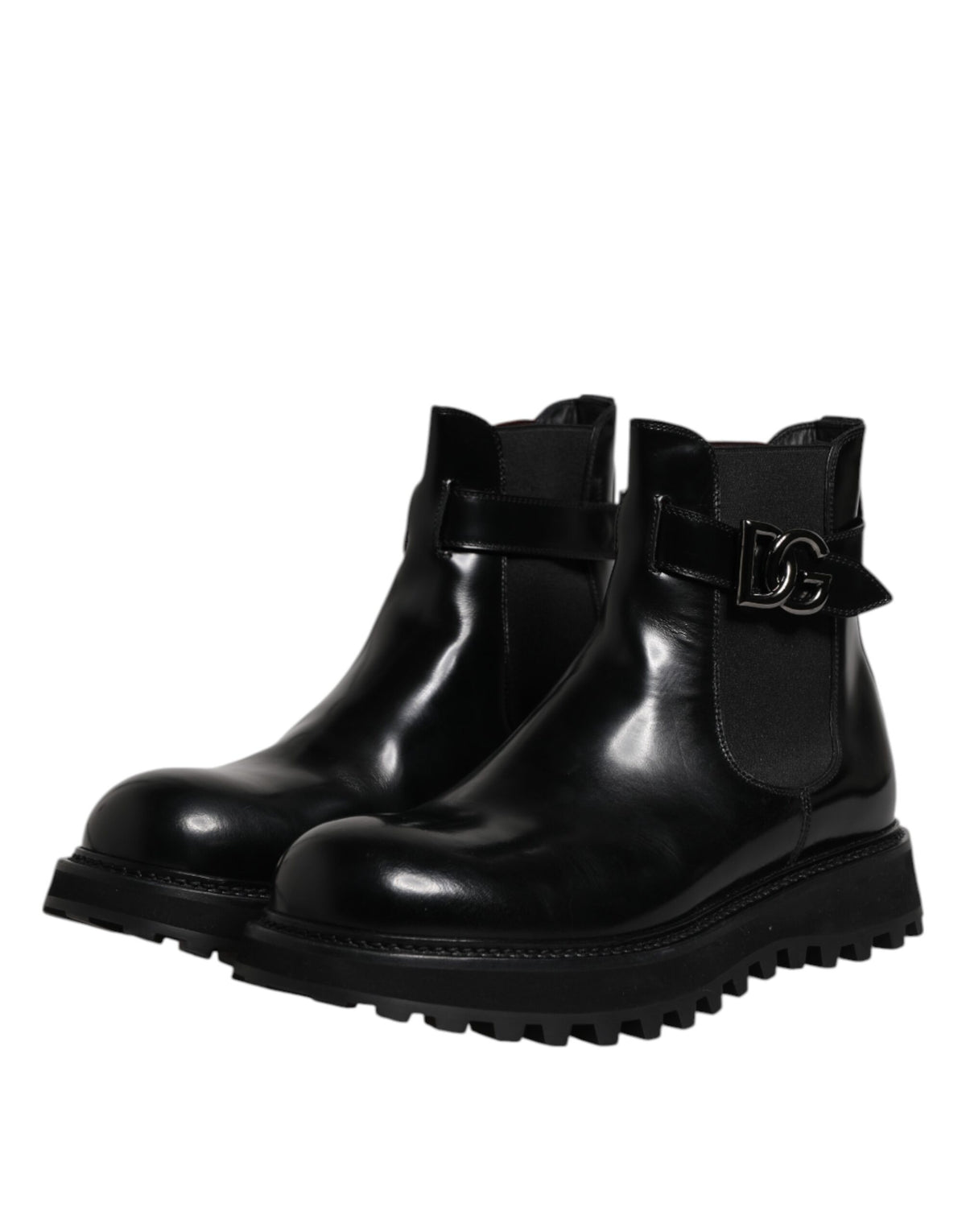 Step into the realm of luxury with Dolce & Gabbana's Black Belted DG Logo Chelsea Boots, where exquisite calf leather meets artisanal craftsmanship for an elevated style statement.