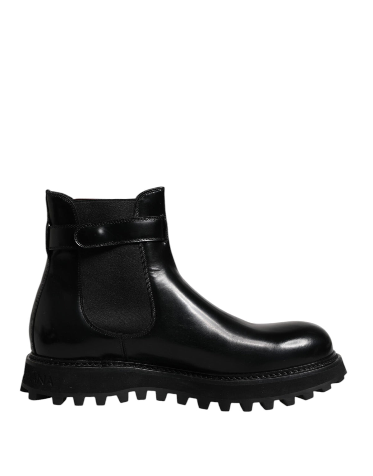 Step into unparalleled elegance with Dolce & Gabbana's Black Belted DG Logo Chelsea Boots, crafted from premium calf leather, embodying timeless sophistication and artisanal luxury.