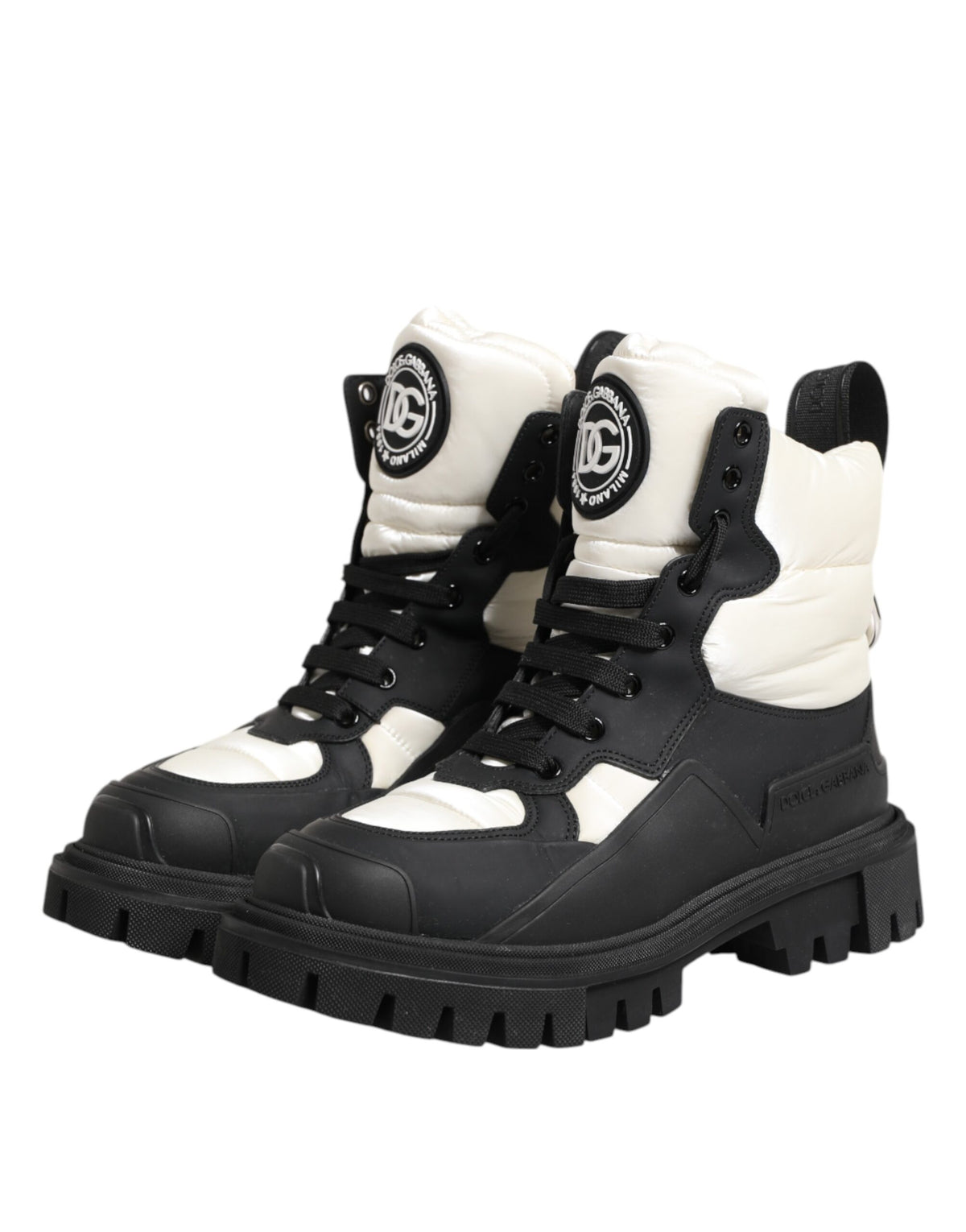 Indulge in the exquisite Dolce & Gabbana Black White Padded Lace Up Short Boots, where luxurious materials meet timeless elegance, elevating your style with every step.