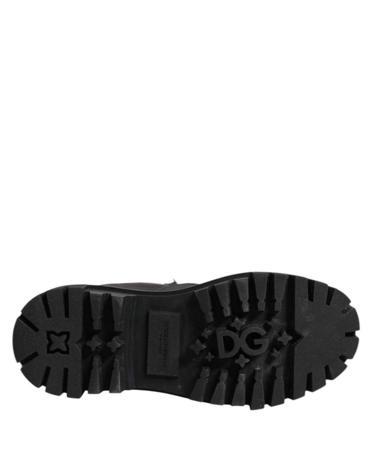 Experience the allure of Dolce & Gabbana's Black White Padded Lace Up Short Boots, where exquisite Italian craftsmanship meets timeless elegance for the discerning individual.