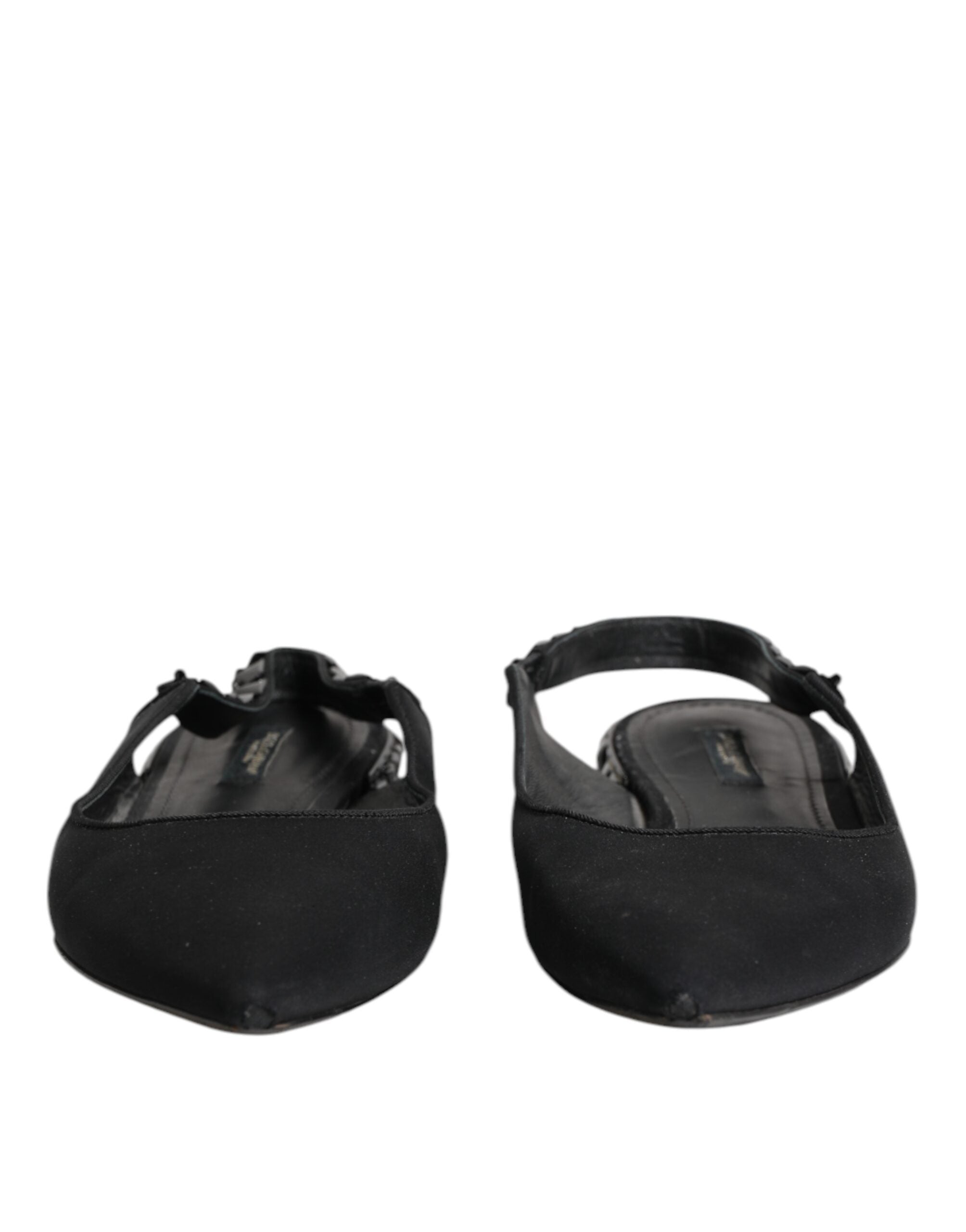 Indulge in the exquisite allure of Dolce & Gabbana's Black Crystal Charmeuse Slingback Shoes, crafted in Italy from luxurious silk, embodying sophistication and timeless elegance.