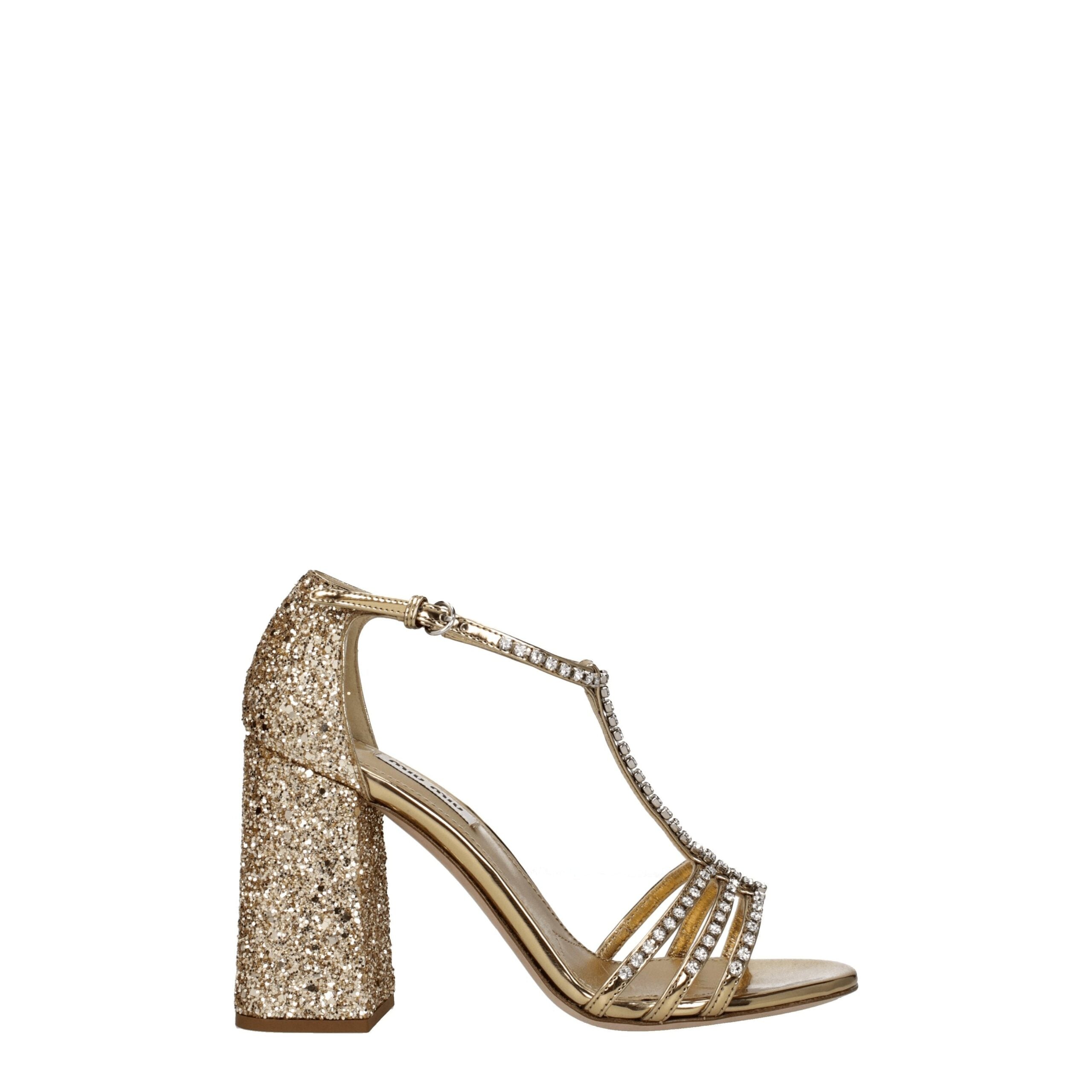 Step into opulence with Miu Miu Gold Plastic Platform Sandals, where luxurious leather and dazzling craftsmanship elevate your style to new heights of allure.