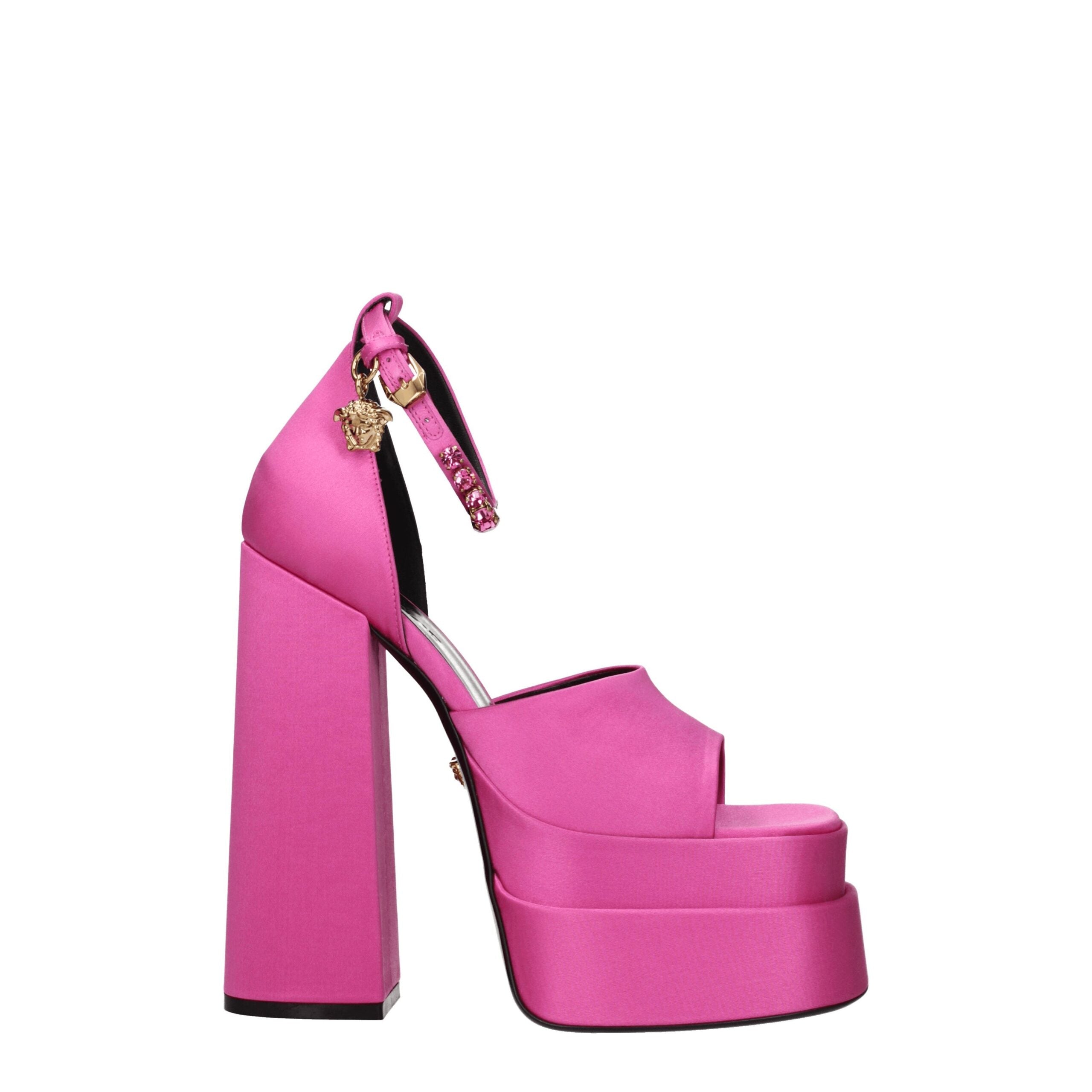 Elevate your elegance with Versace Pink Satin Platform Sandals, where luxurious fuchsia satin meets exquisite craftsmanship, perfect for the discerning individual.