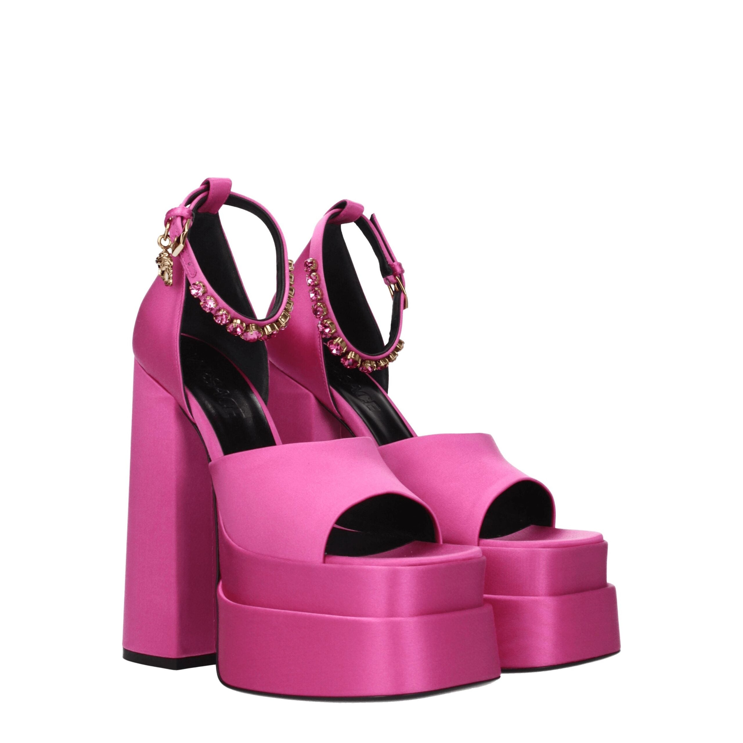 Elevate your elegance with Versace Pink Satin Platform Sandals, where luxurious fuchsia satin and radiant rhinestones redefine haute couture sophistication.