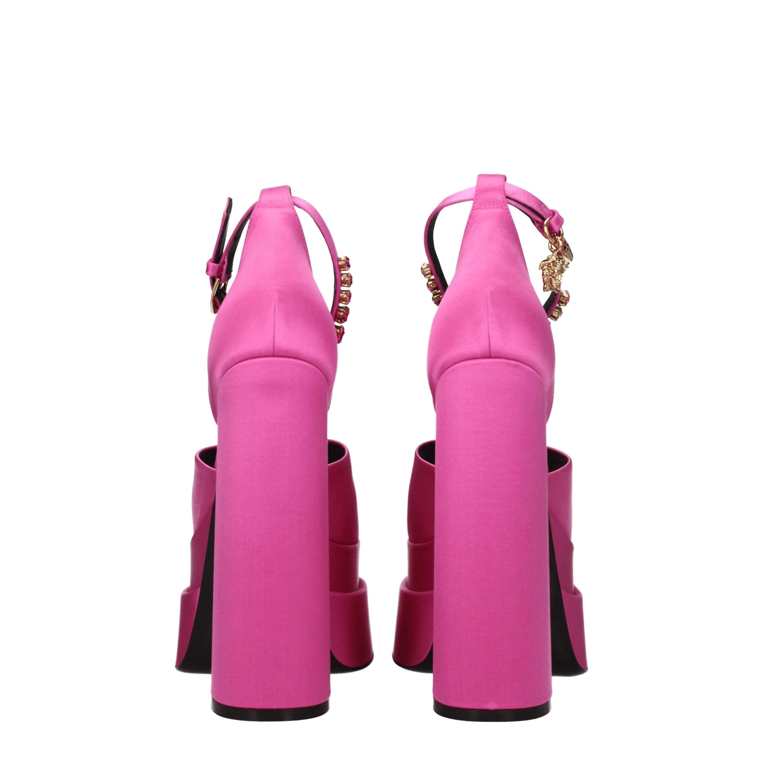 Elevate your elegance with Versace Pink Satin Platform Sandals, where luxurious satin and radiant rhinestones redefine haute couture sophistication for the discerning individual.