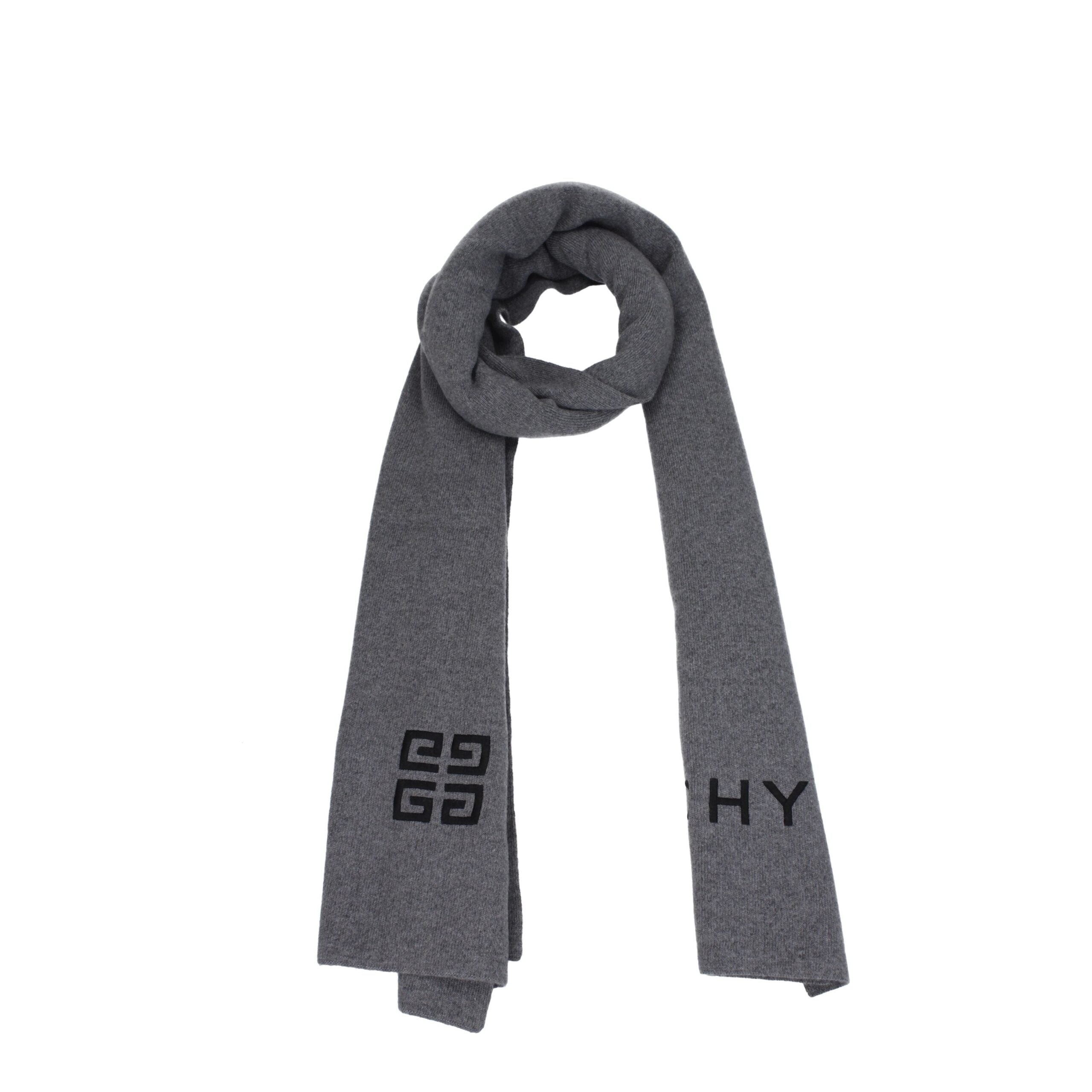 Indulge in the Givenchy Gray Wool Scarf, a luxurious blend of wool and cashmere, elevating your style with timeless elegance and unmatched versatility for every occasion.