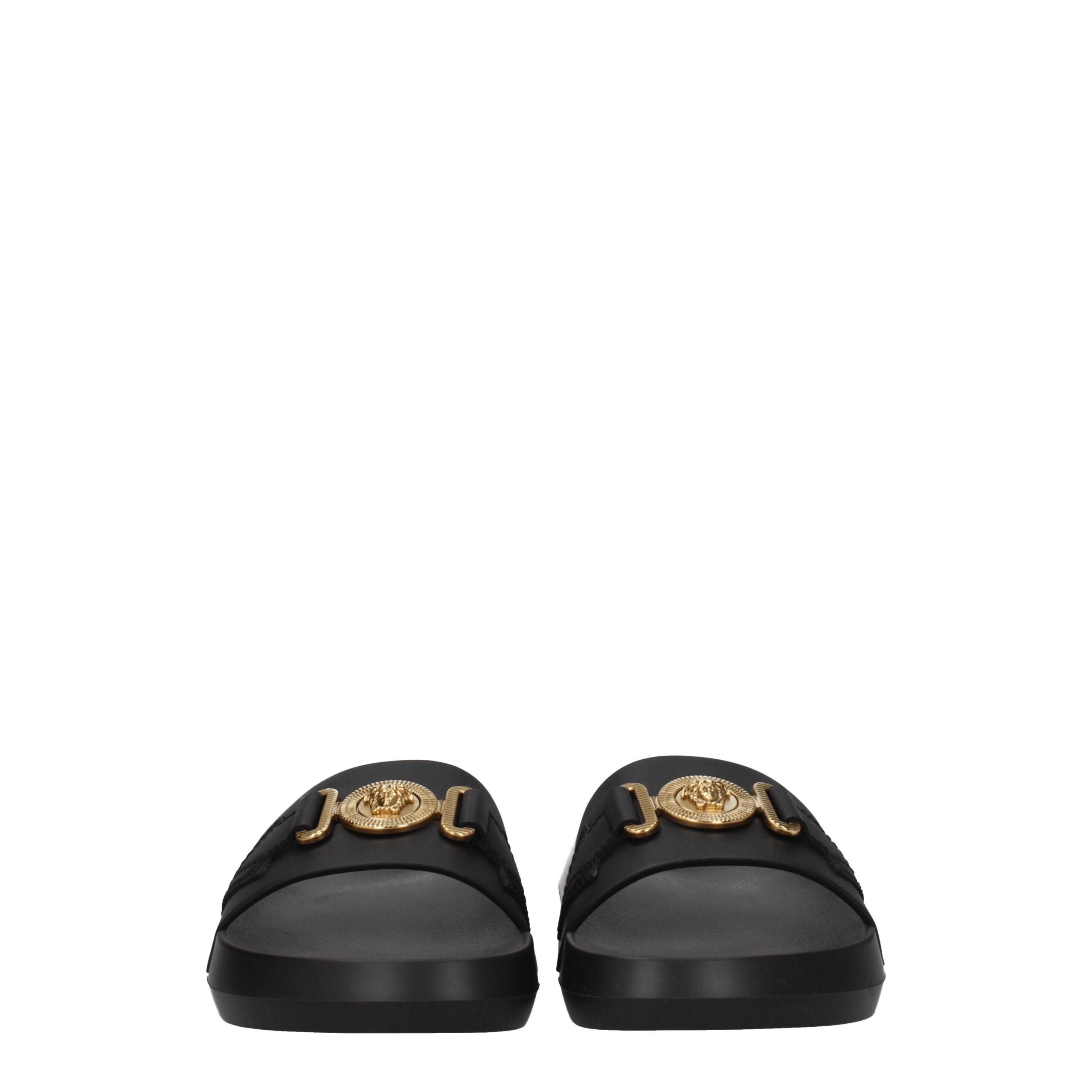 Experience the exquisite craftsmanship of Versace Black Leather Slippers, where premium leather meets timeless elegance for effortless sophistication and luxury.