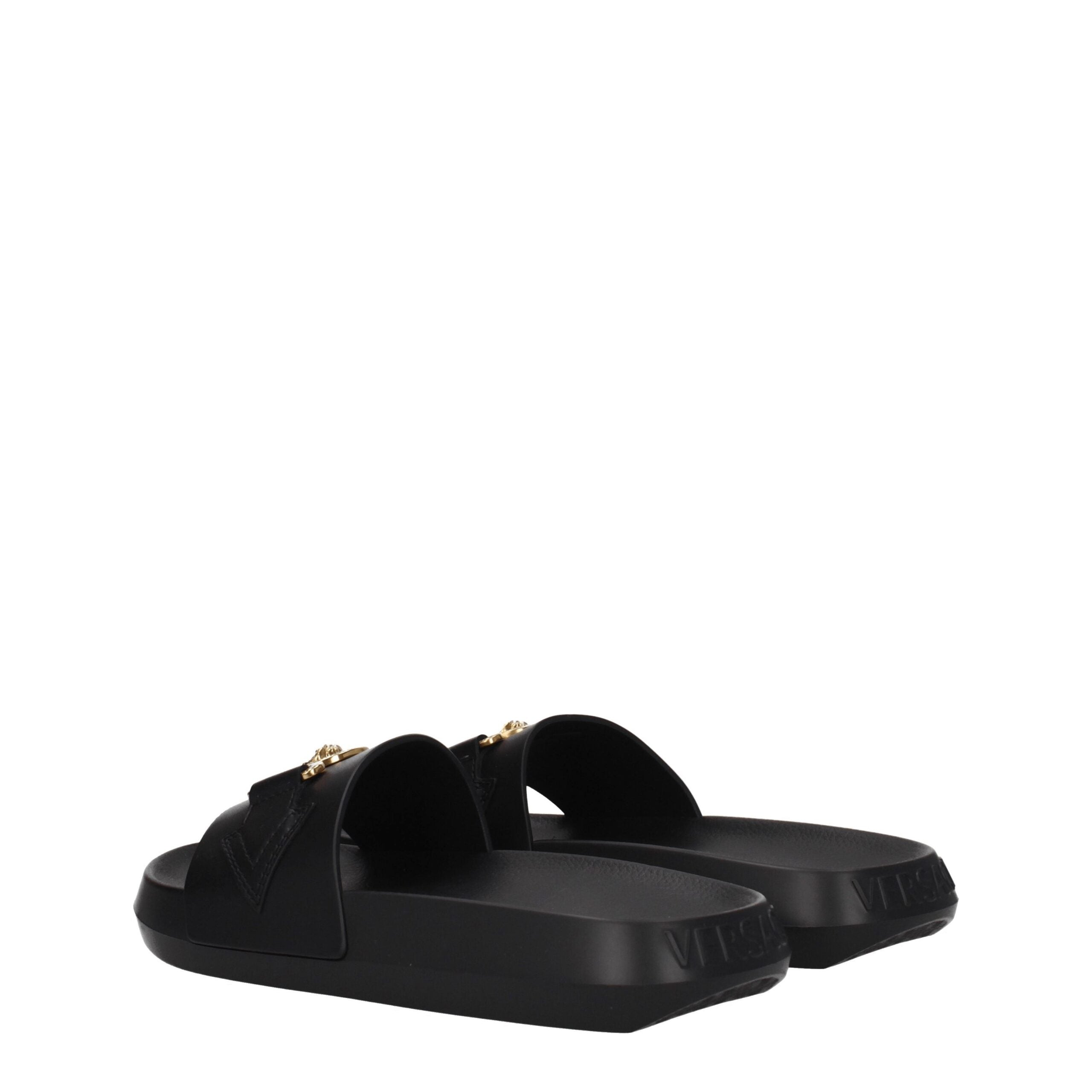 Experience the exquisite craftsmanship of Versace Black Leather Slippers, where premium leather meets timeless elegance, elevating your every moment with luxurious sophistication.
