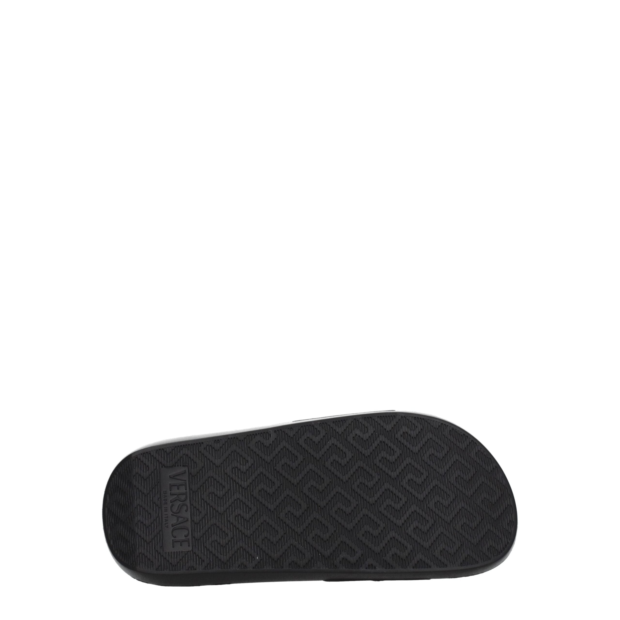 Experience the exquisite craftsmanship of Versace Black Leather Slippers, where premium leather meets timeless elegance for effortless sophistication and luxurious comfort.