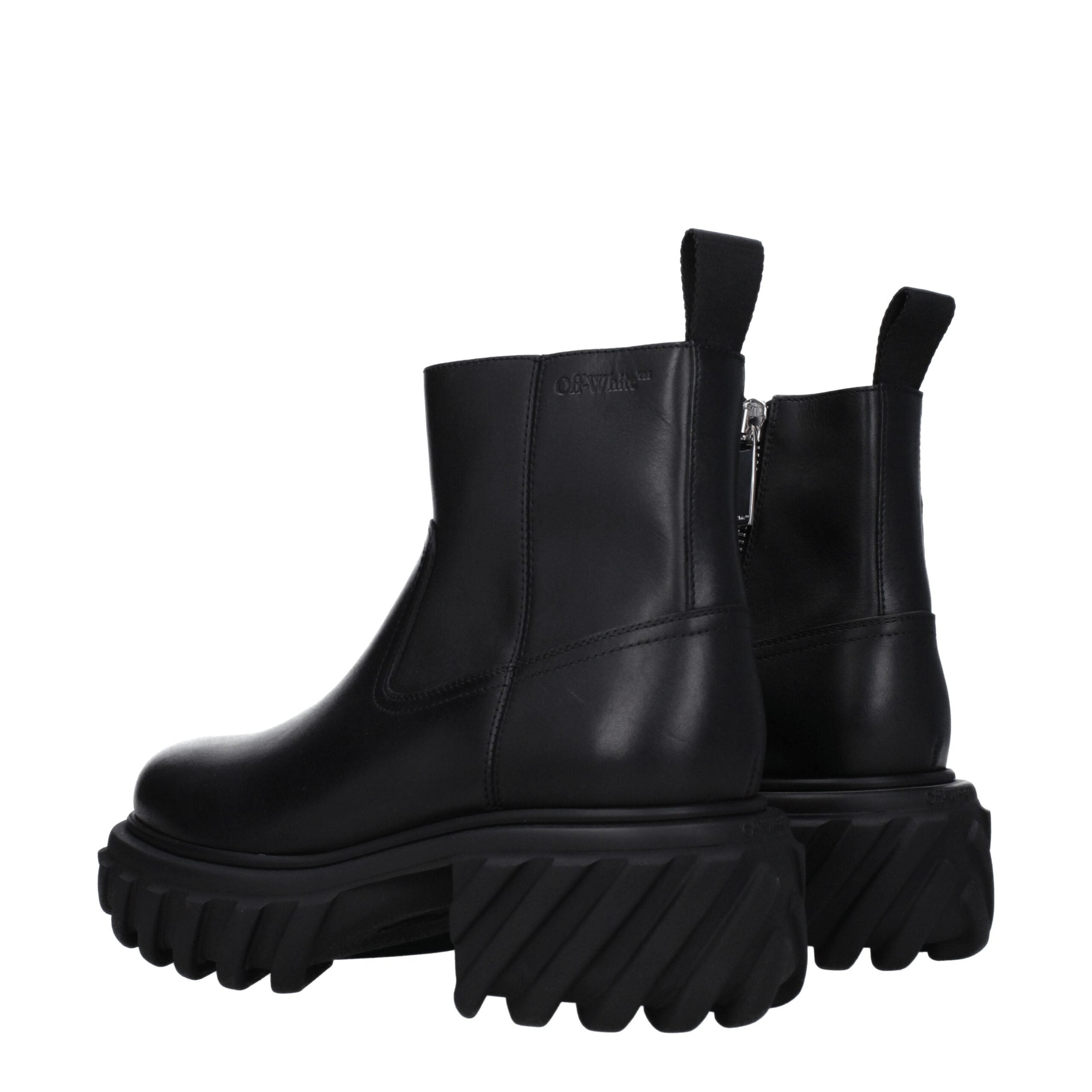 Discover the Off-White Black Leather Ankle Boots, a masterpiece of artisanal luxury, blending premium craftsmanship with timeless elegance for the discerning connoisseur.