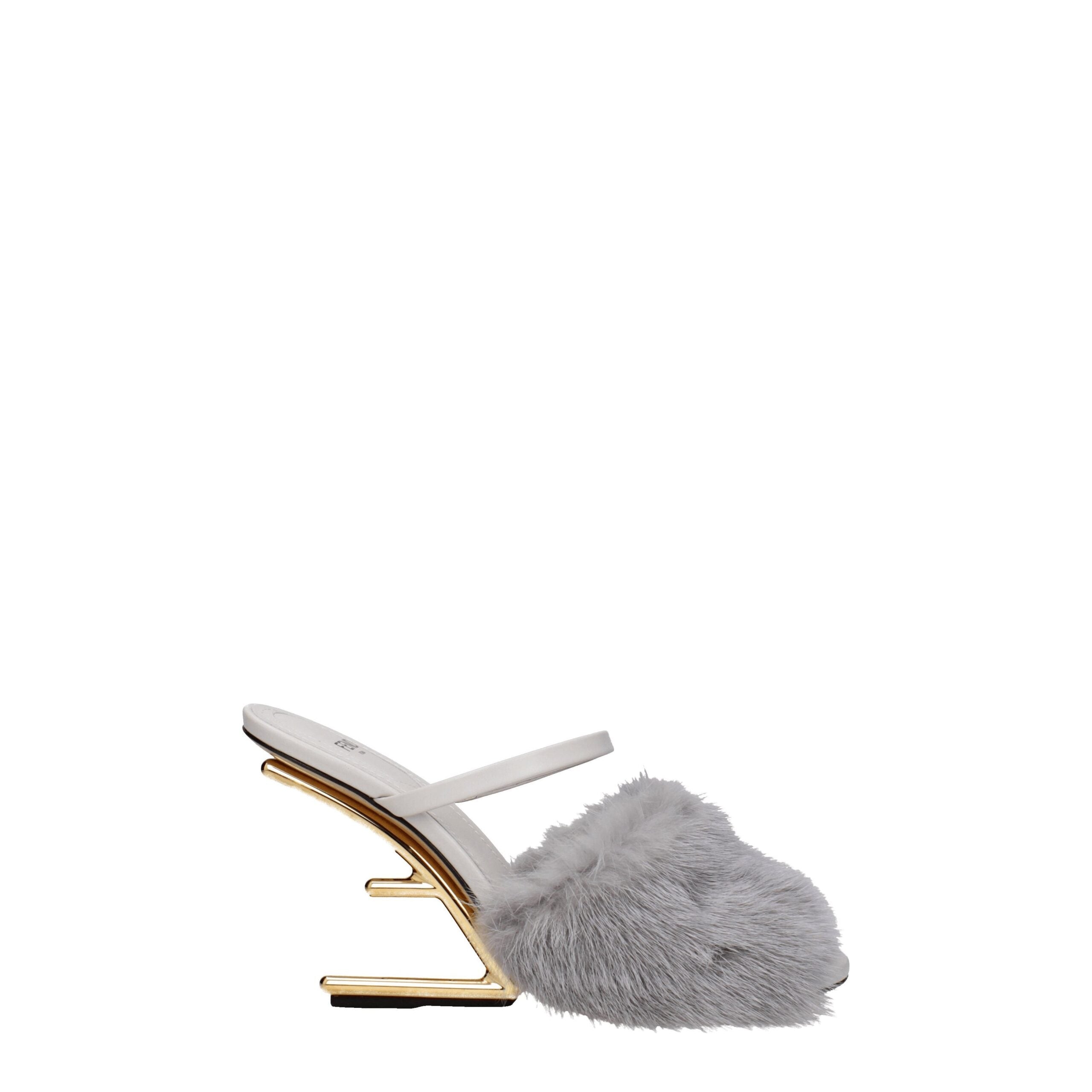 Indulge in the Fendi Gray Mink Slippers, where exquisite craftsmanship meets sumptuous materials, elevating your style with timeless luxury and effortless elegance.