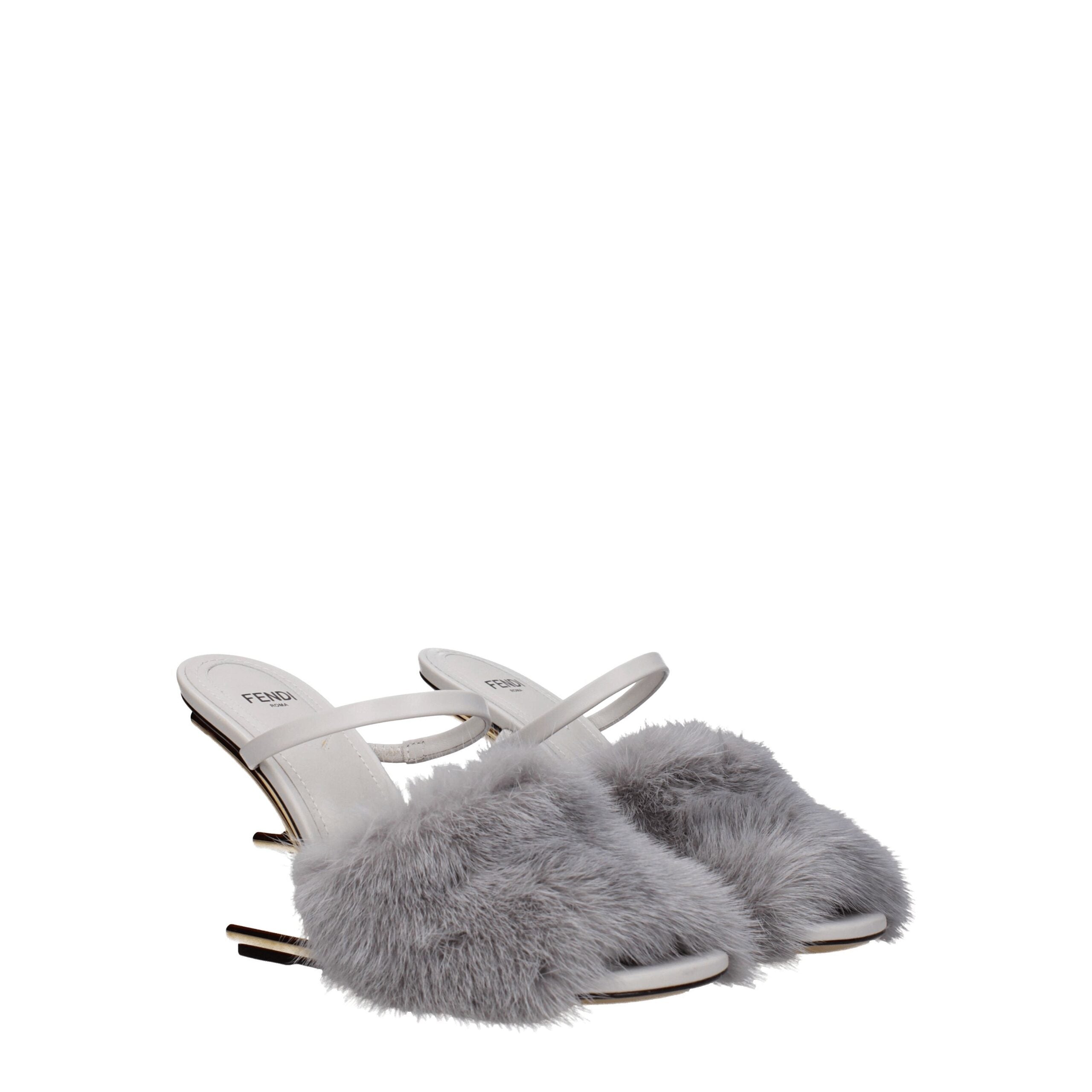 Indulge in the Fendi Gray Mink Slippers, where sumptuous gray mink meets exquisite craftsmanship, elevating your style with timeless luxury and effortless elegance.