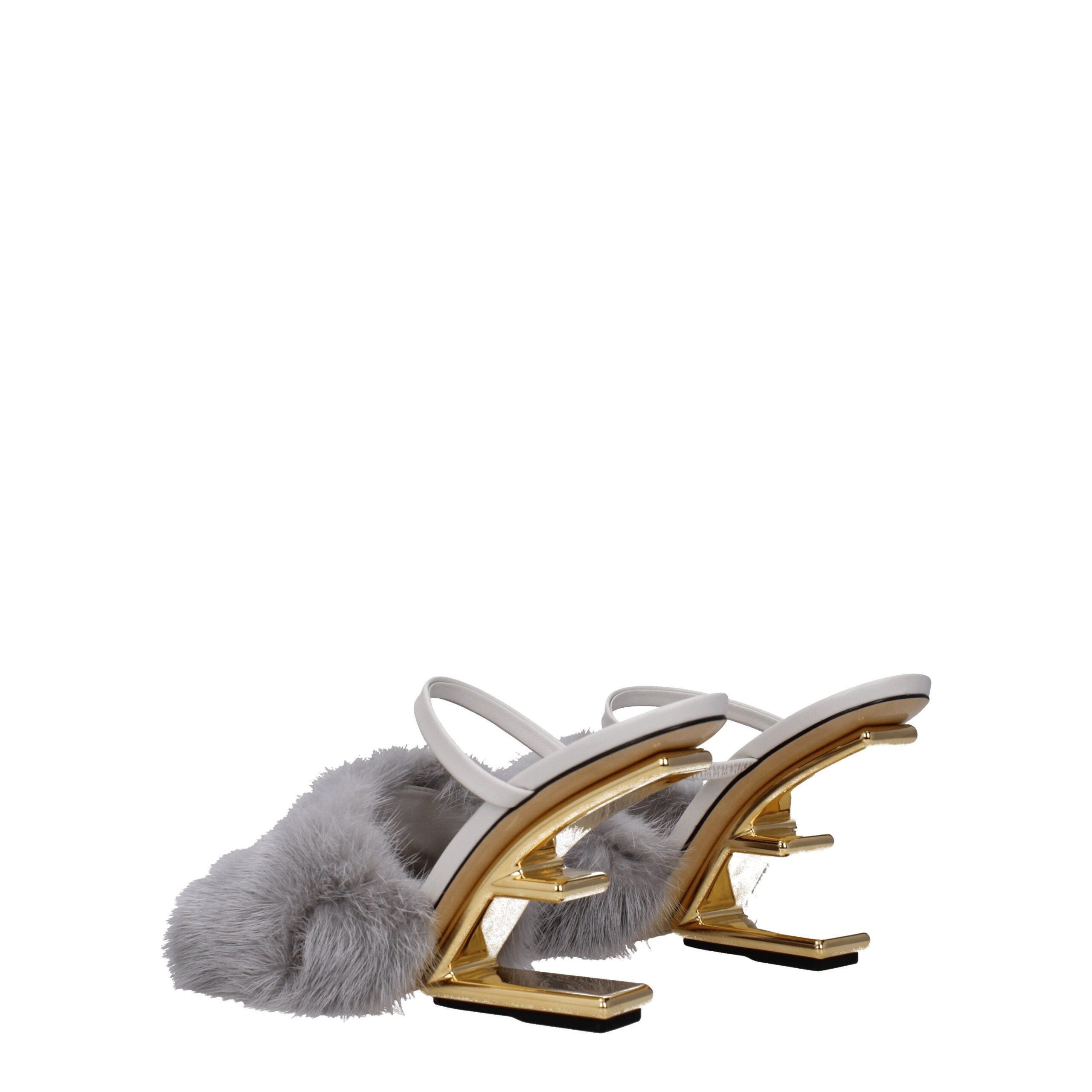 Indulge in the Fendi Gray Mink Slippers, where sumptuous gray mink and exquisite craftsmanship elevate your style, embodying timeless luxury for discerning tastes.