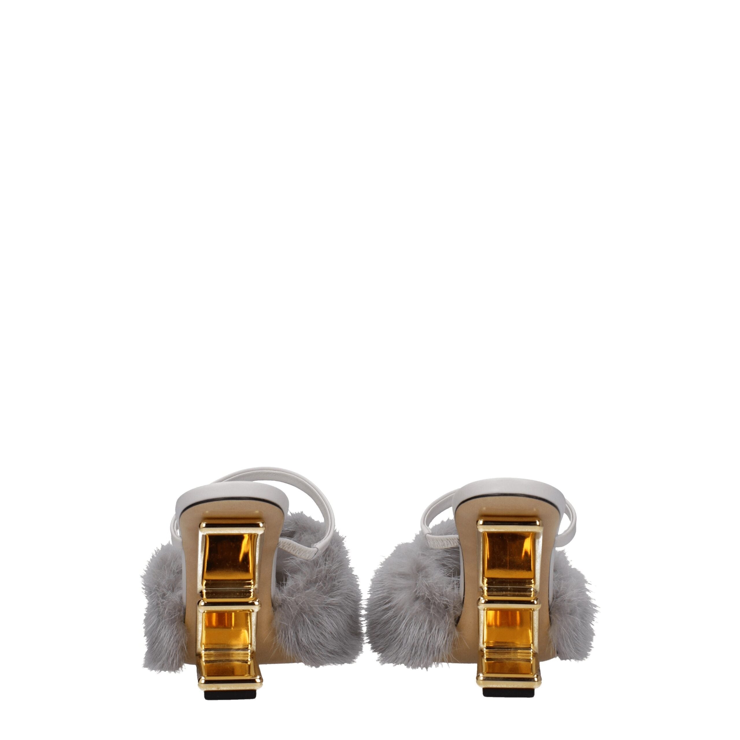 Indulge in the Fendi Gray Mink Slippers, where sumptuous gray mink meets exquisite craftsmanship, offering a timeless luxury that elevates every ensemble.