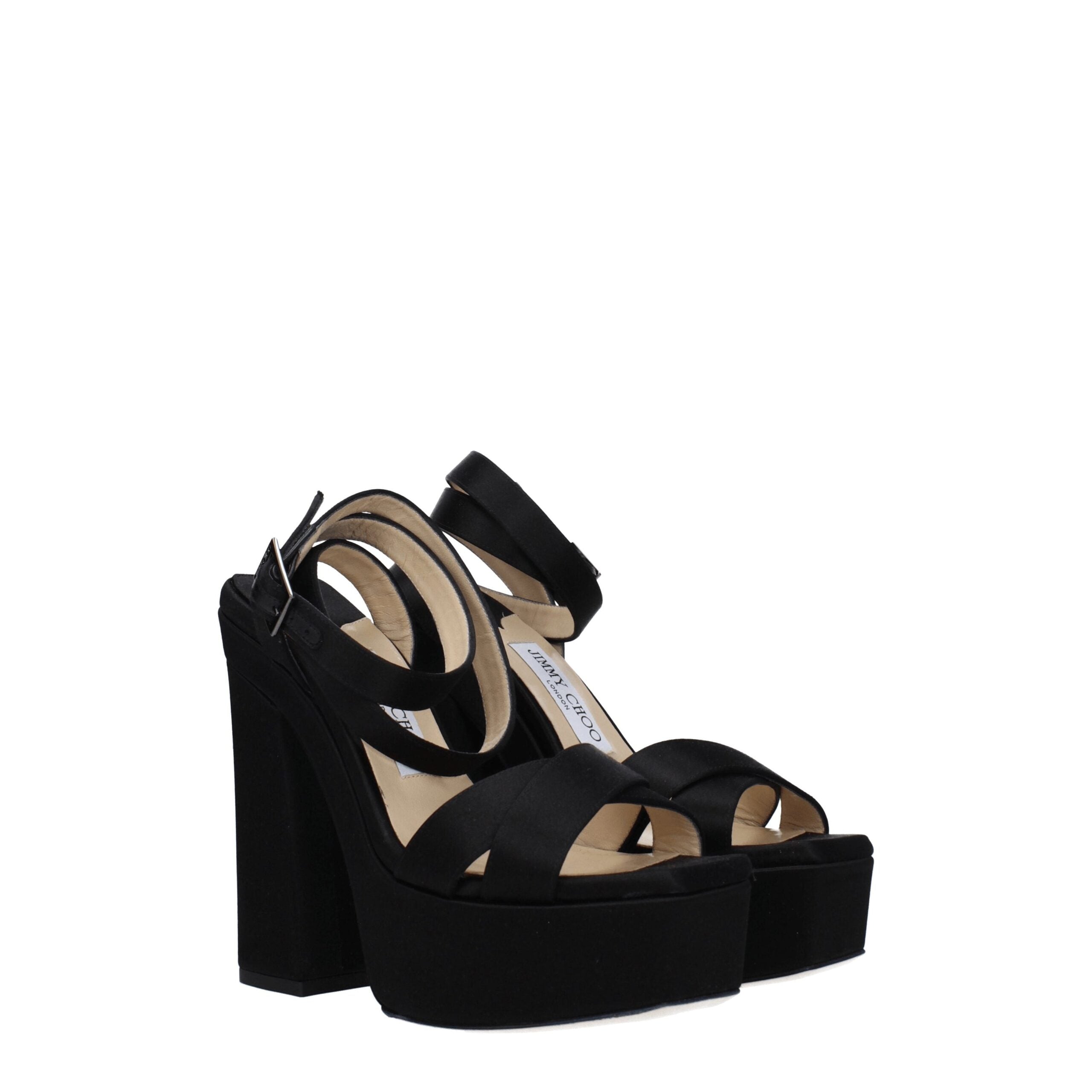 Step into opulence with Jimmy Choo Black Satin Platform Sandals, where exquisite satin and a striking silhouette elevate your style for unforgettable moments.