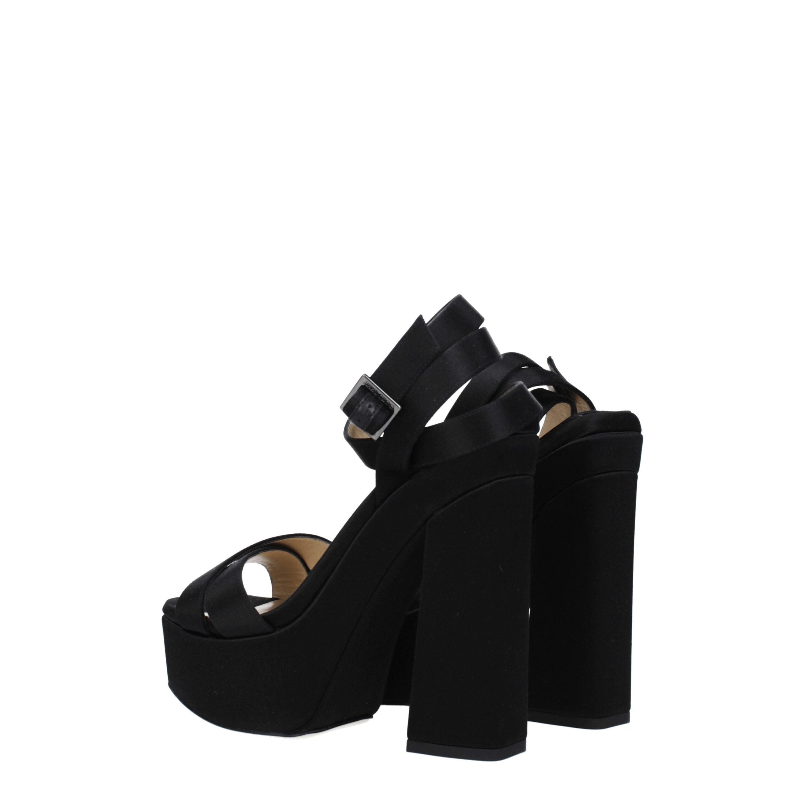 Step into a realm of elegance with Jimmy Choo Black Satin Platform Sandals, where exquisite satin meets luxurious design, perfect for unforgettable moments.