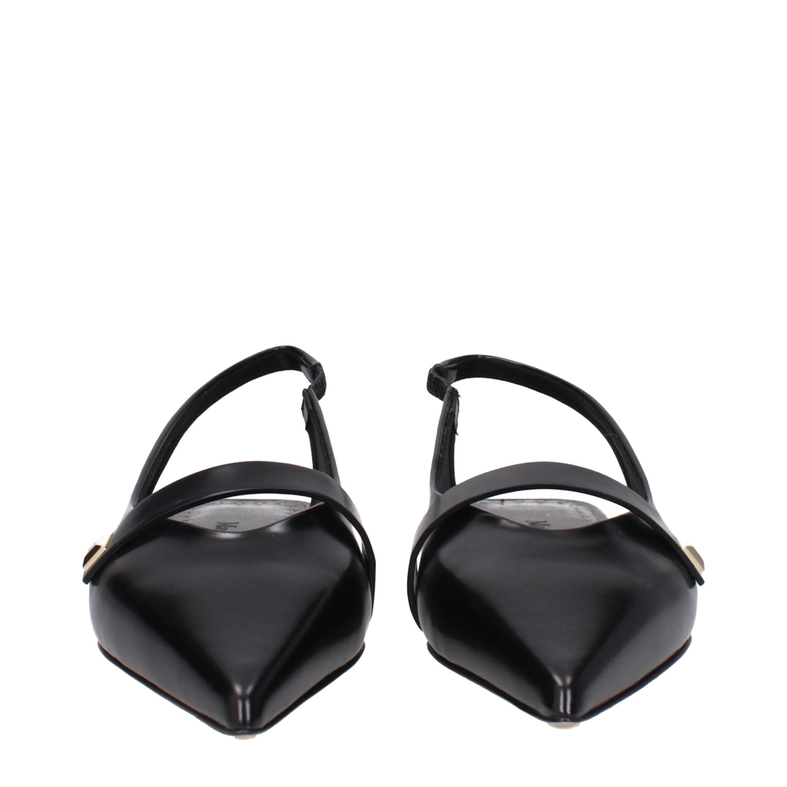 Step into the realm of elegance with Max Mara Black Leather Ballet Flats, crafted from premium leather for timeless sophistication and unparalleled versatility.
