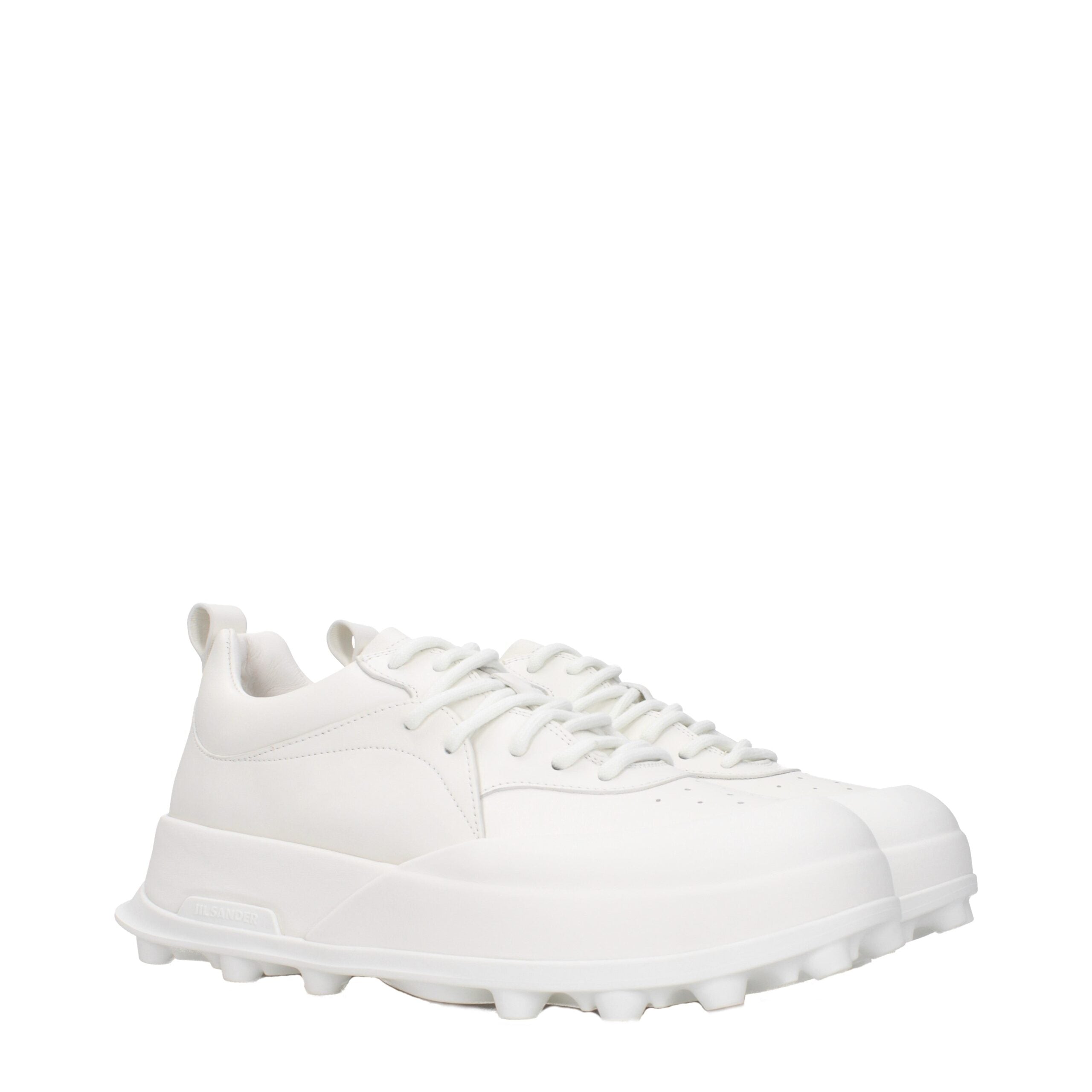 Indulge in the luxurious allure of Jil Sander White Leather Sneakers, crafted from sumptuous leather for timeless elegance and unmatched comfort, perfect for any occasion.
