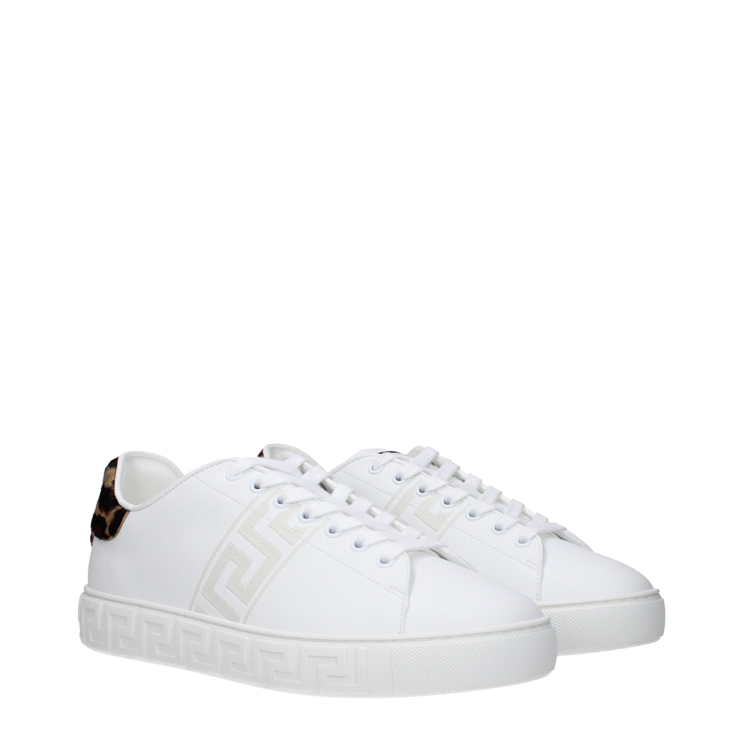 Elevate your style with Versace White Leather Low Top Sneakers, where exquisite Italian craftsmanship meets luxurious comfort, embodying sophistication for the discerning individual.