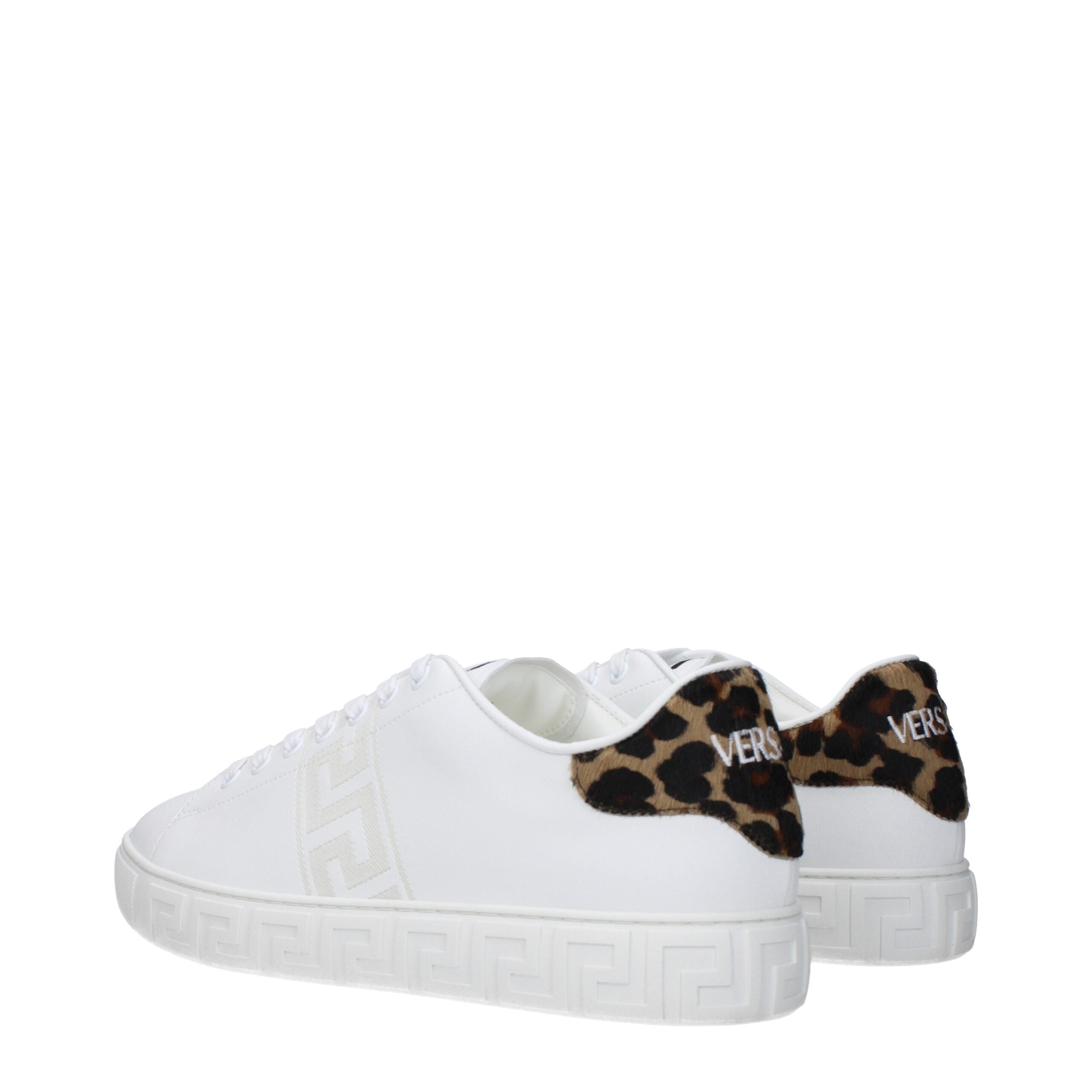 Experience the allure of Versace's White Leather Low Top Sneakers, where exquisite Italian craftsmanship meets effortless elegance for the discerning individual.