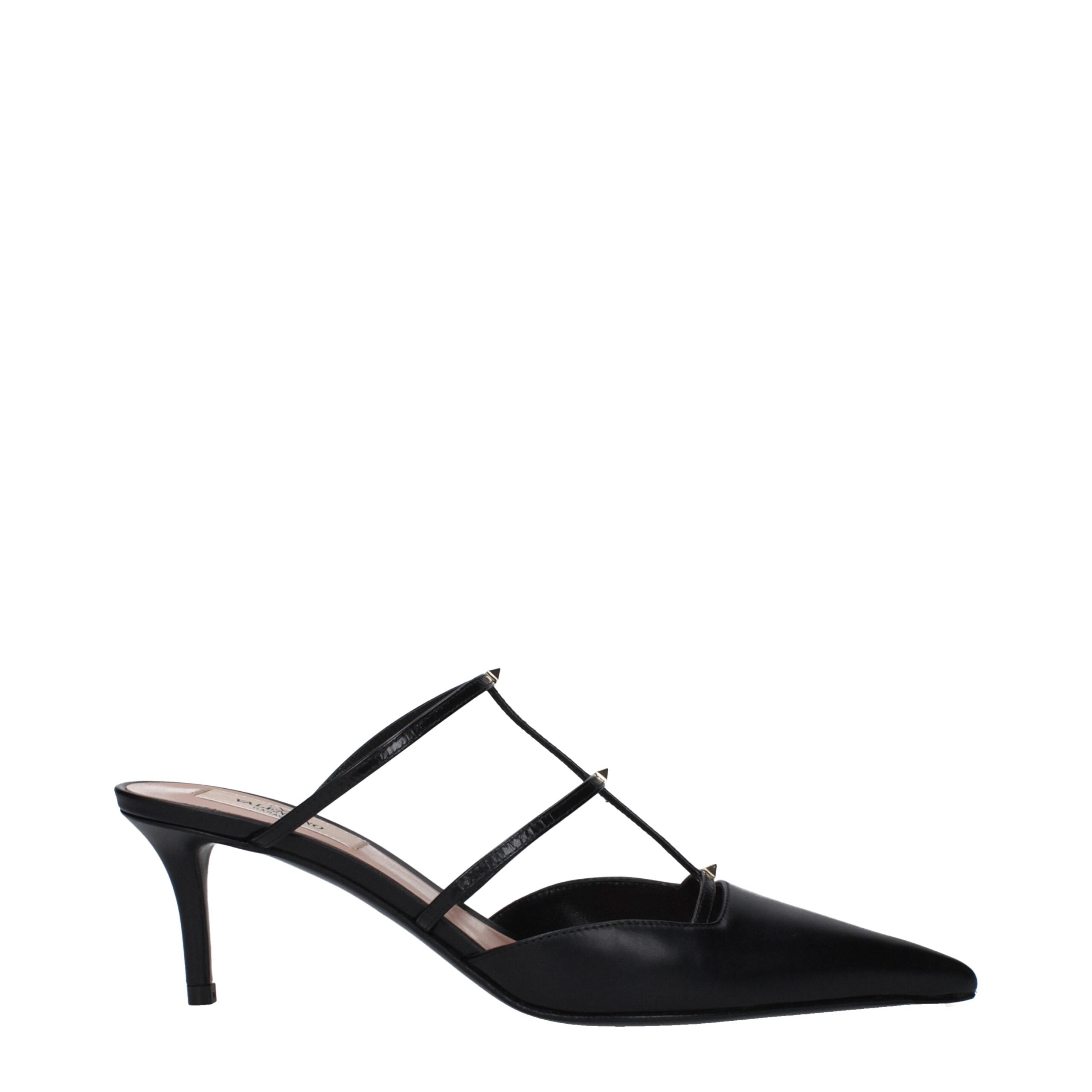 Experience the allure of Valentino Garavani Black Leather Flat Sandals, where exquisite craftsmanship meets timeless elegance, perfect for the discerning connoisseur.
