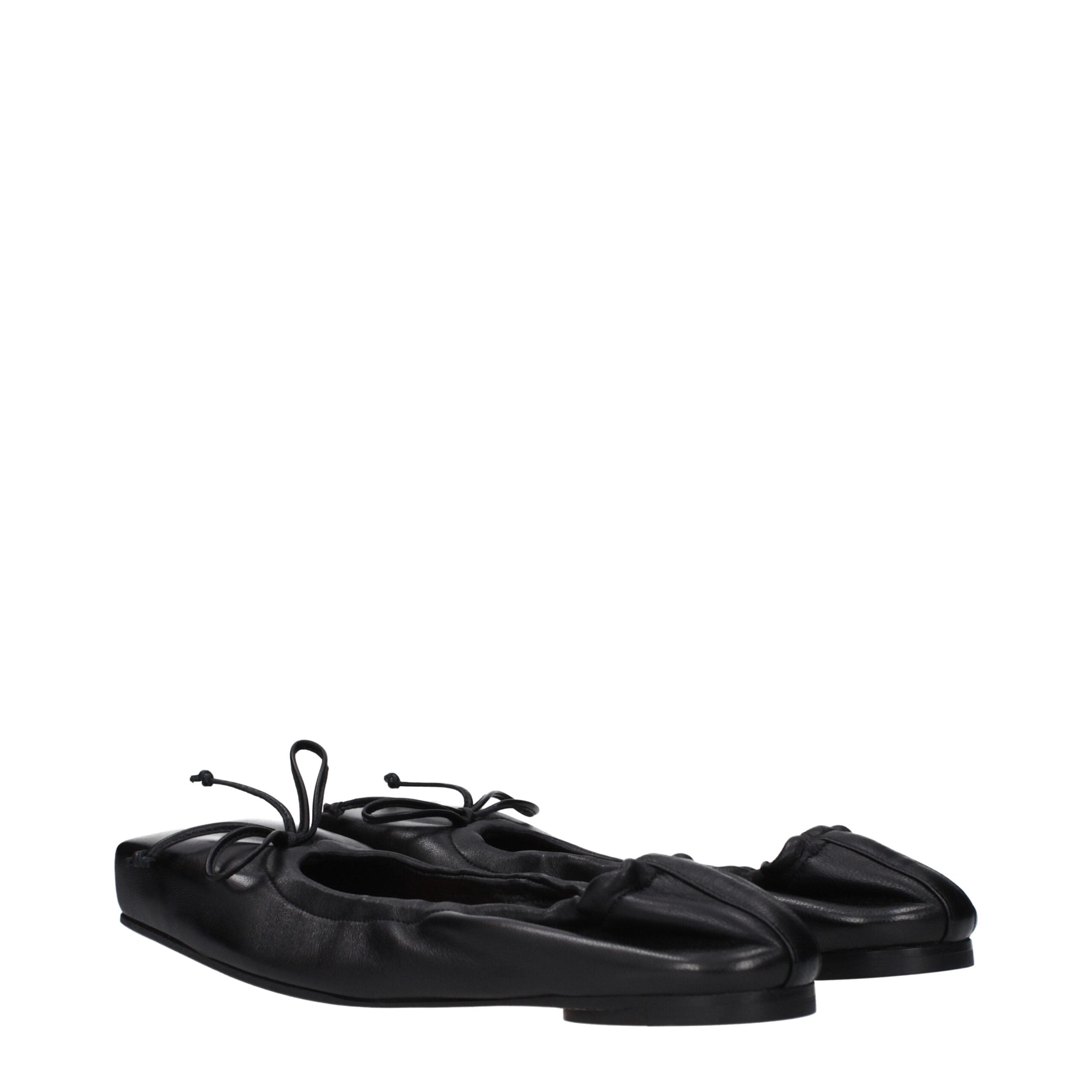 Indulge in the exquisite craftsmanship of Jacquemus Black Leather Ballet Flats, where premium leather meets timeless elegance for effortless sophistication in every step.