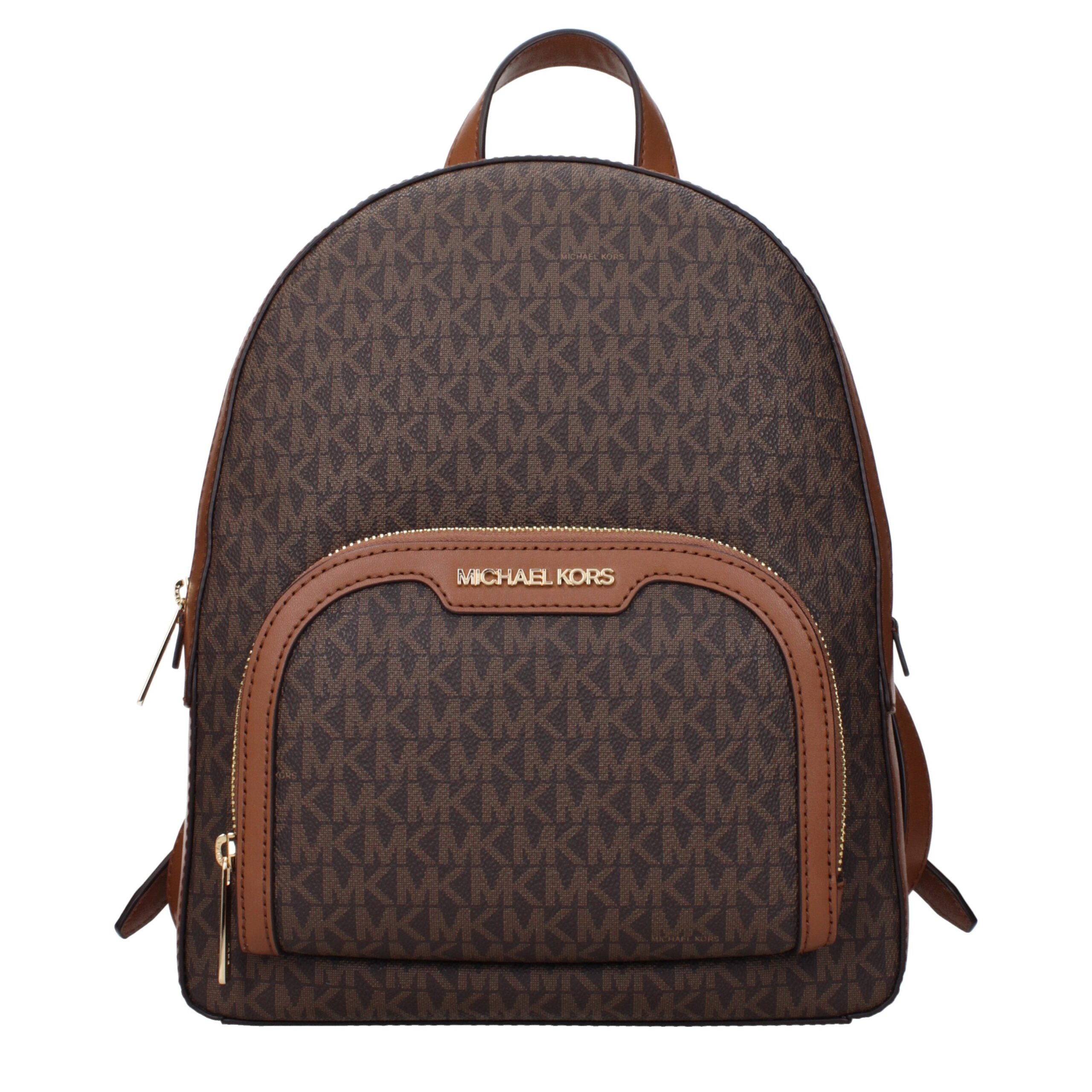 Elevate your style with the Michael Kors Brown Fabric Backpack, a luxurious blend of elegance and functionality, perfect for the discerning individual.