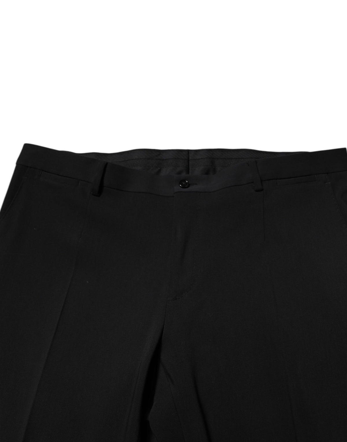 Elevate your wardrobe with the Dolce & Gabbana Black Cotton Single Breasted Suit, a masterpiece of Italian craftsmanship, blending luxury and sophistication for the discerning individual.