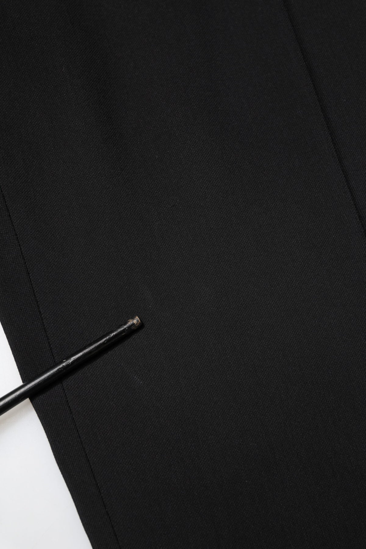 Indulge in the exquisite allure of the Dolce & Gabbana Black Cotton Single Breasted Suit, a masterpiece of Italian craftsmanship designed for the discerning individual.