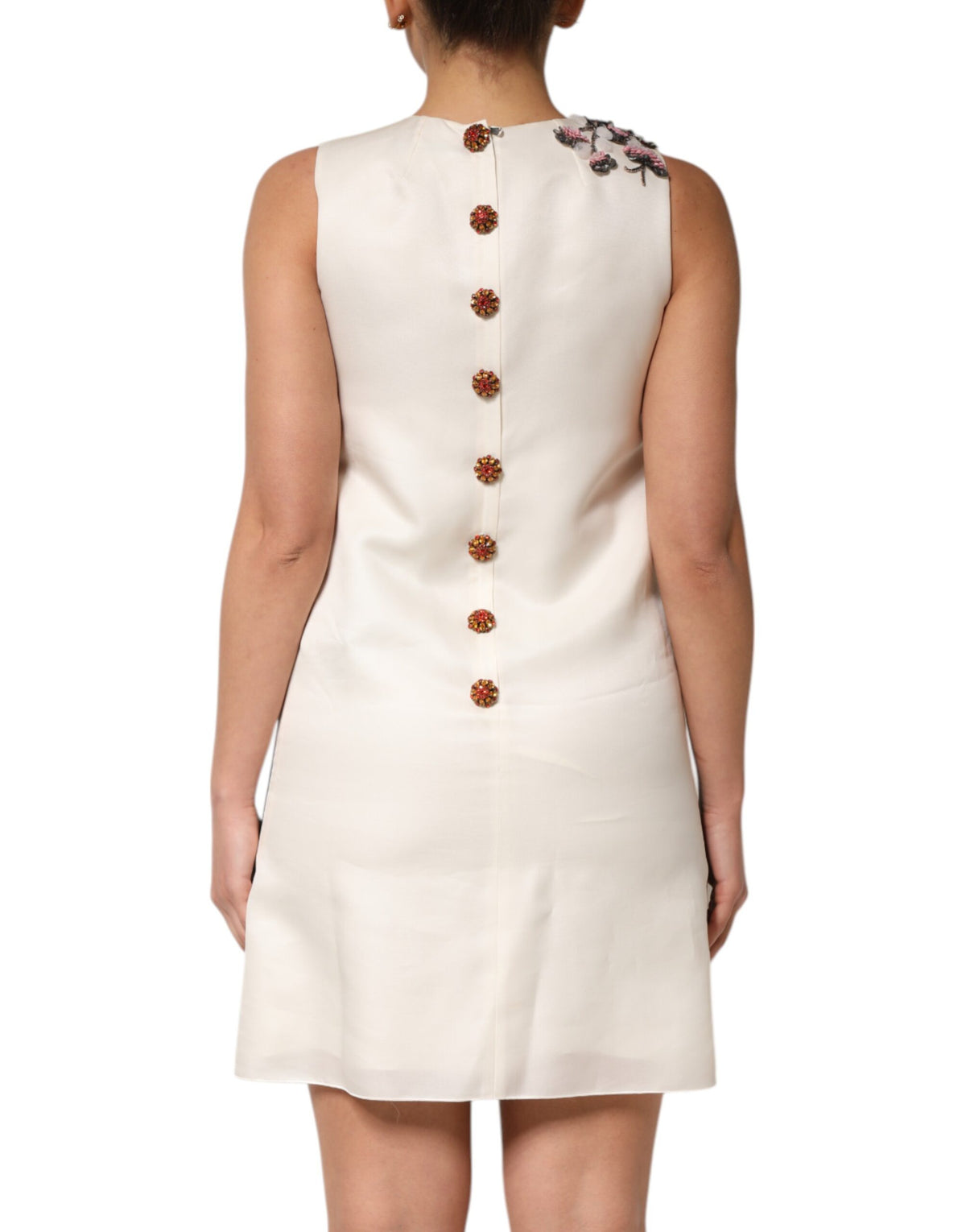 Elevate your style with the Dolce & Gabbana Multicolor Crystal Embellished A-line Mini Dress, a masterpiece of silk and artistry, embodying luxurious sophistication for the discerning fashionista.