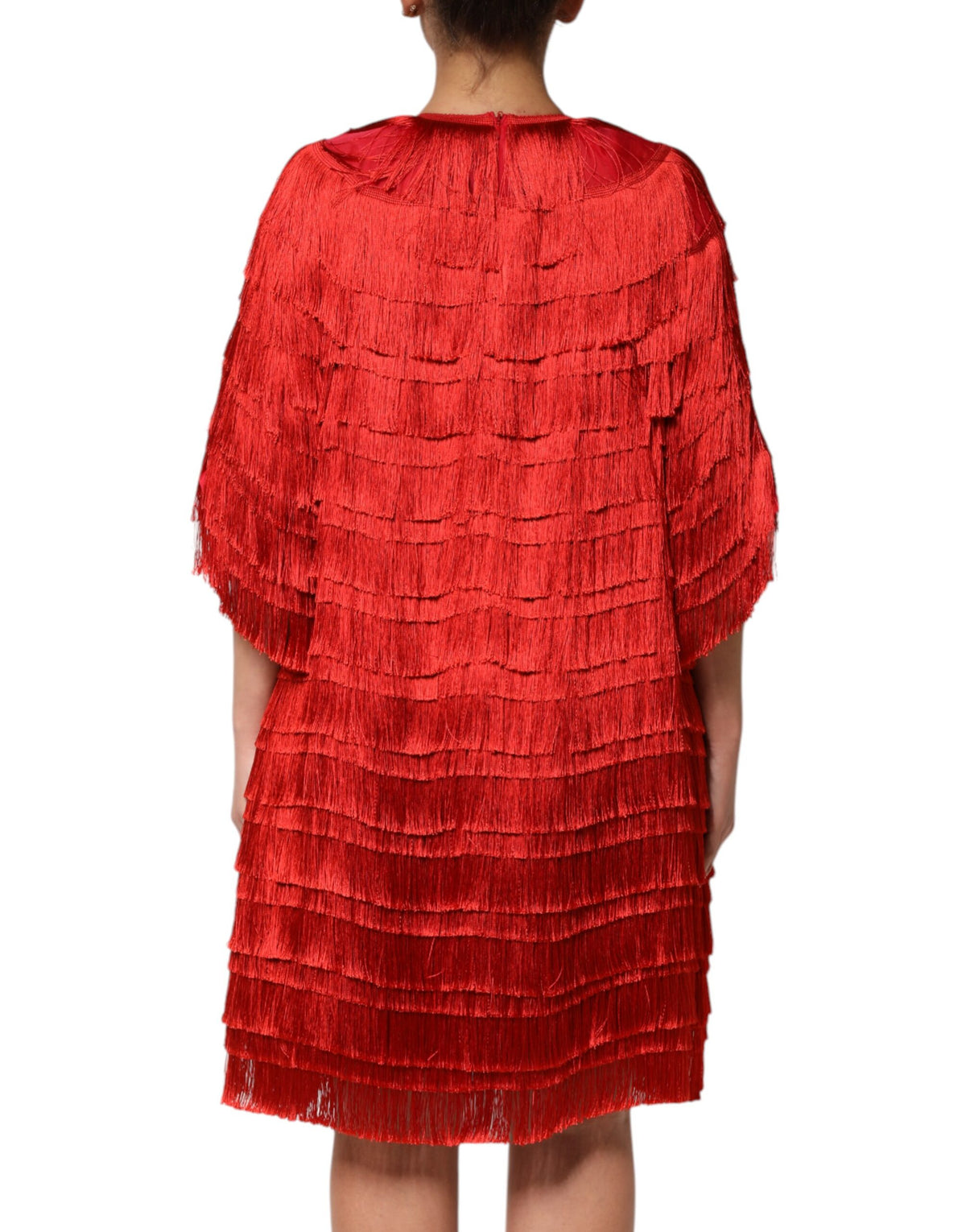 Indulge in the exquisite allure of the Dolce & Gabbana Red Silk Tiers Fringe Shift Dress, a masterpiece of luxurious silk craftsmanship designed for those who embody elegance and confidence.