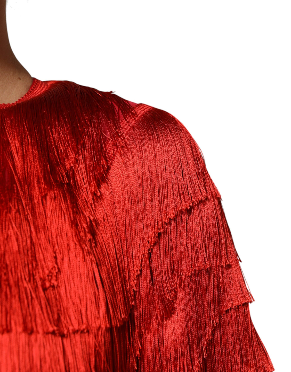 Experience the allure of the Dolce & Gabbana Red Silk Tiers Fringe Shift Dress, a masterpiece of Italian craftsmanship designed for those who embody elegance and sophistication.