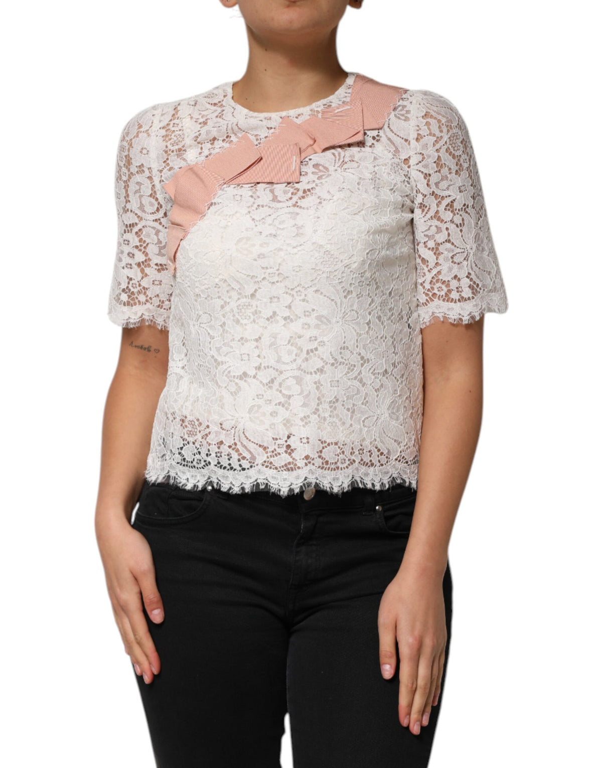Elevate your wardrobe with the Dolce & Gabbana White Floral Lace Blouse Top, a masterpiece of exquisite craftsmanship and luxurious materials, perfect for any occasion.