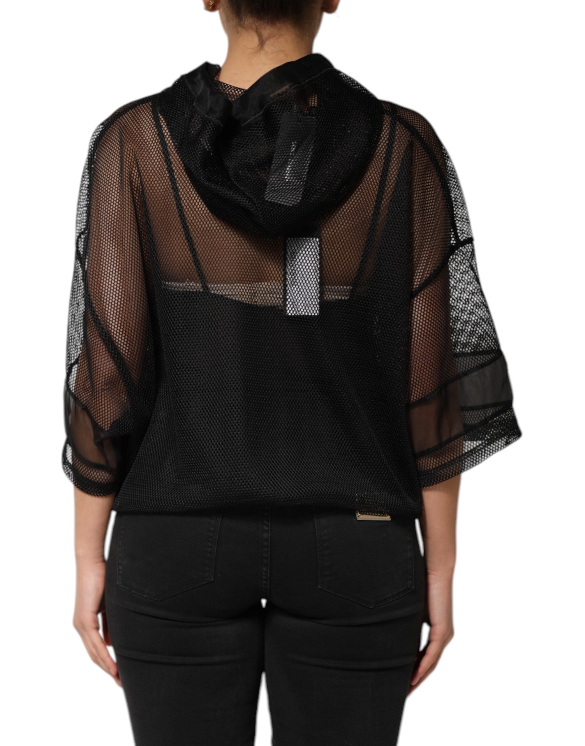 Elevate your wardrobe with the Dolce & Gabbana Black See Through Hooded Pullover Sweater, a luxurious blend of silk and polyester, embodying exquisite Italian craftsmanship and timeless elegance.