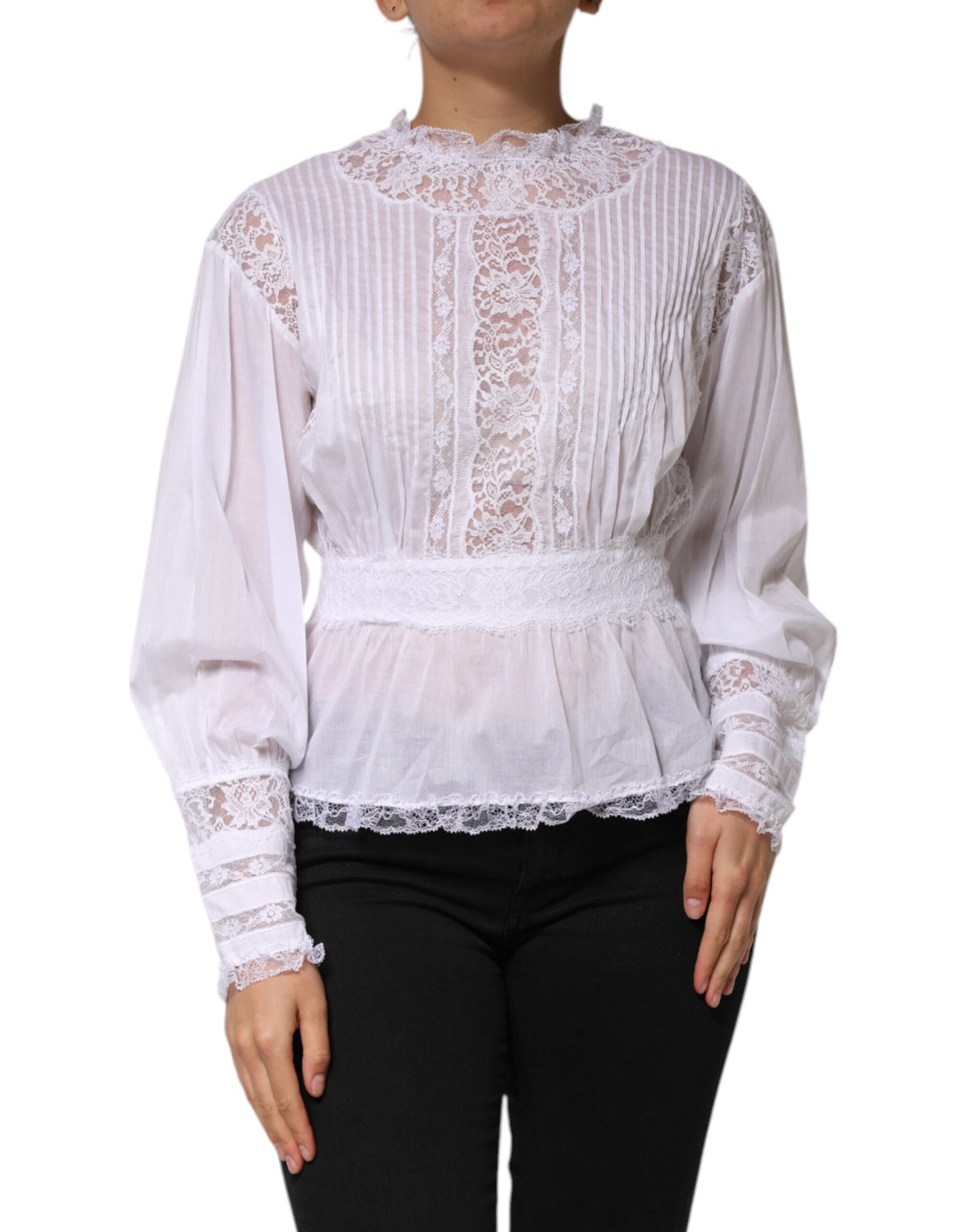 Discover the Dolce & Gabbana White Cotton Floral Lace Long Sleeves Top, a masterpiece of Italian craftsmanship that epitomizes luxury and timeless elegance.