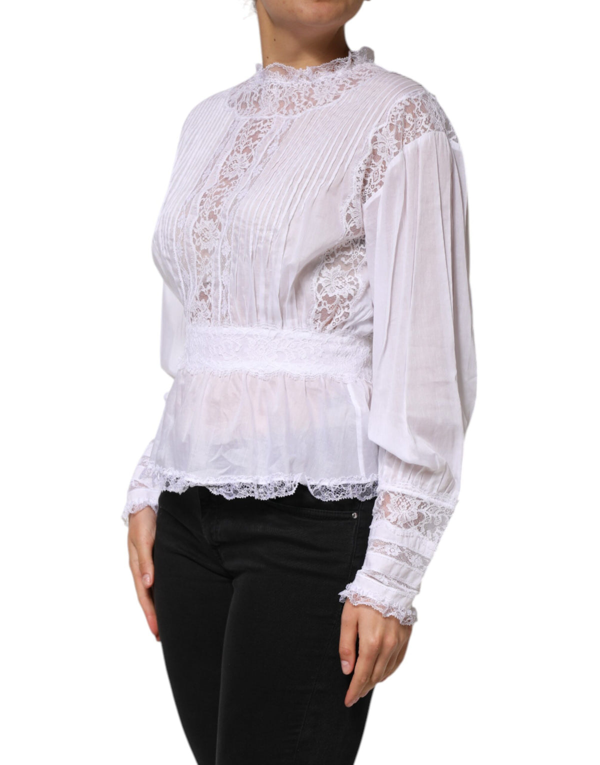 Indulge in the exquisite allure of Dolce & Gabbana's White Cotton Floral Lace Long Sleeves Top, a testament to Italian craftsmanship and timeless elegance, perfect for any sophisticated occasion.