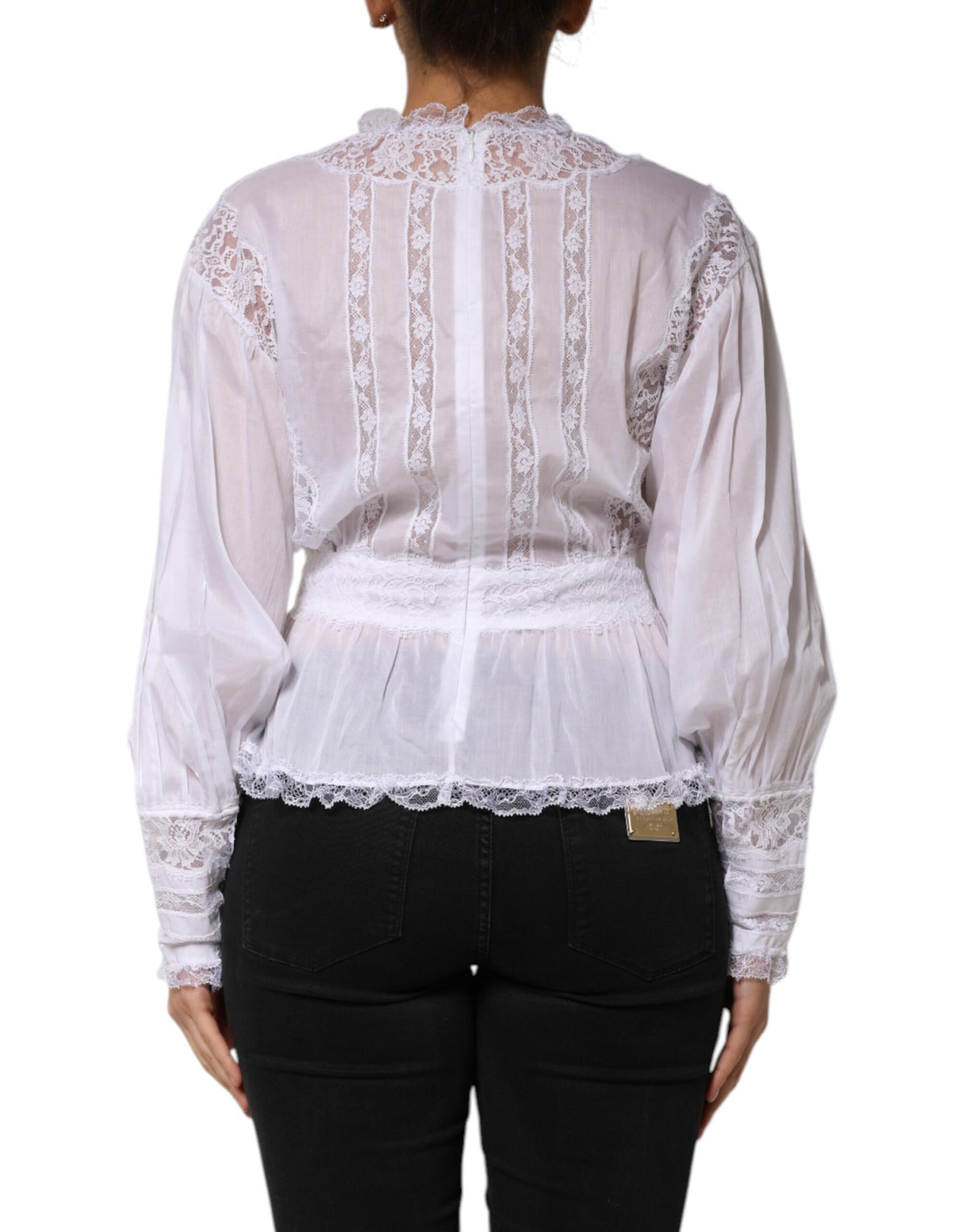 Discover the exquisite Dolce & Gabbana White Cotton Floral Lace Long Sleeves Top, a testament to Italian craftsmanship that elevates your elegance and allure.