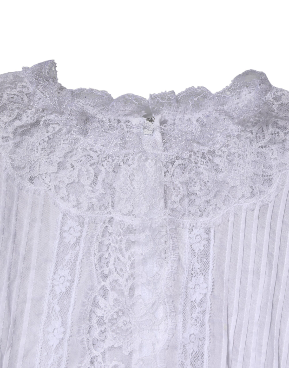 Experience the allure of Dolce & Gabbana's White Cotton Floral Lace Long Sleeves Top, a masterpiece of Italian craftsmanship that embodies timeless elegance and sensuality.
