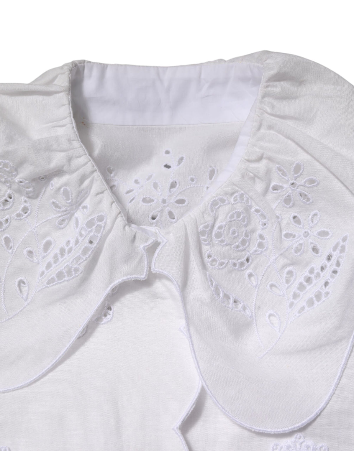 Elevate your wardrobe with the Dolce & Gabbana White Ruffled Lace Embellished Blouse, a masterpiece of Italian craftsmanship in luxurious cotton-linen blend, perfect for sophisticated moments.