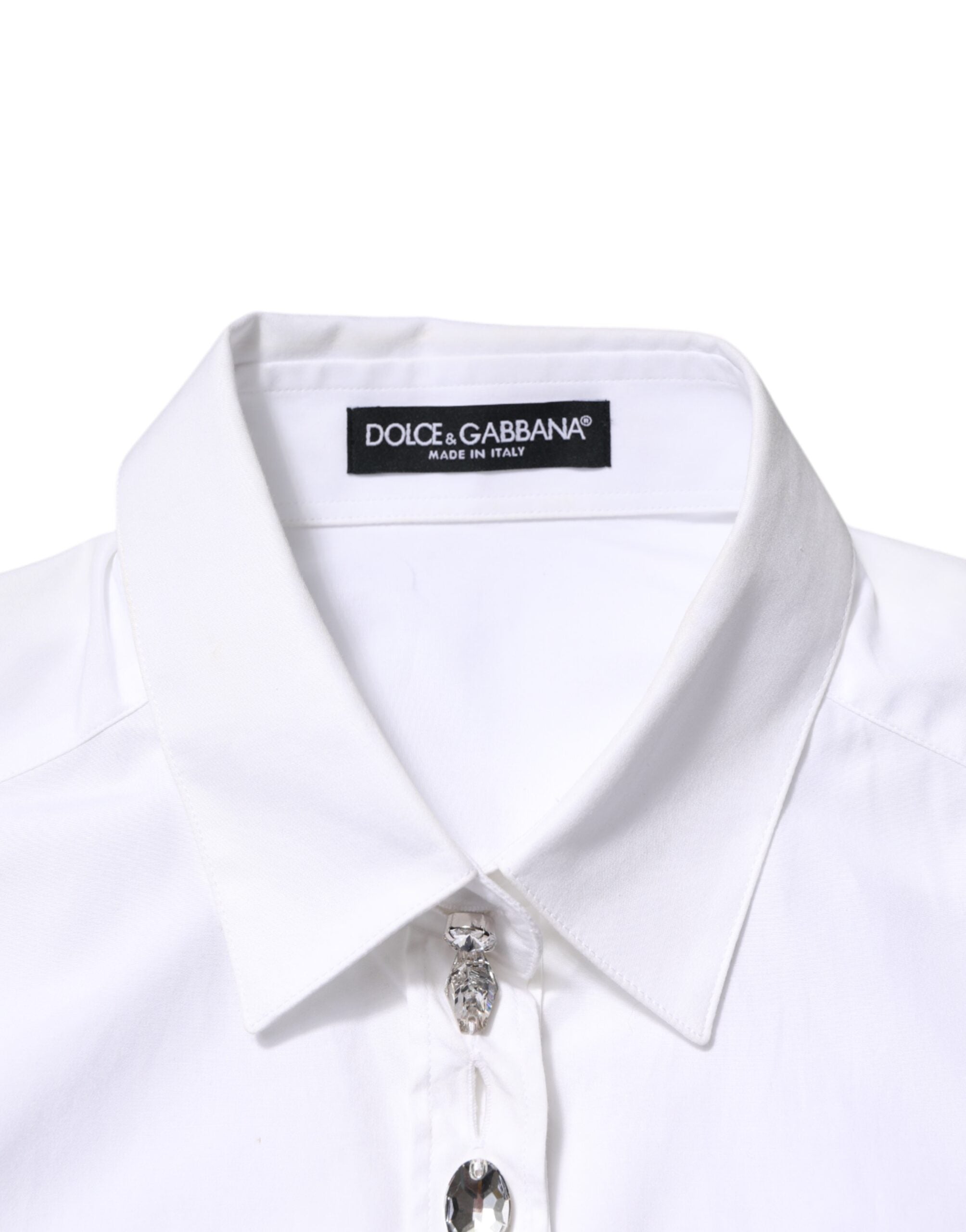 Experience the allure of Dolce & Gabbana's White Crystal Embellished Collared Shirt Top, a testament to Italian craftsmanship in luxurious cotton, perfect for the discerning individual.