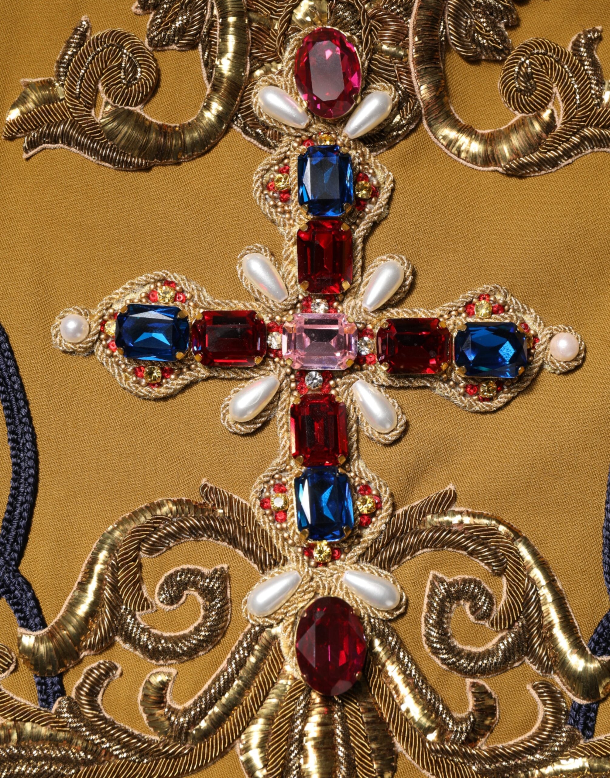 Discover the Dolce & Gabbana Yellow Crystal Cross Runway Vest, a luxurious blend of cotton and elastane, embodying haute couture elegance and Italian artistry.