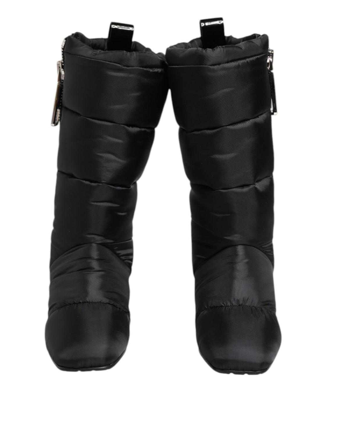 Experience the allure of Dolce & Gabbana's Black Padded Mid Calf Logo Heel Boots, where exquisite craftsmanship meets luxurious materials for an elevated style statement.