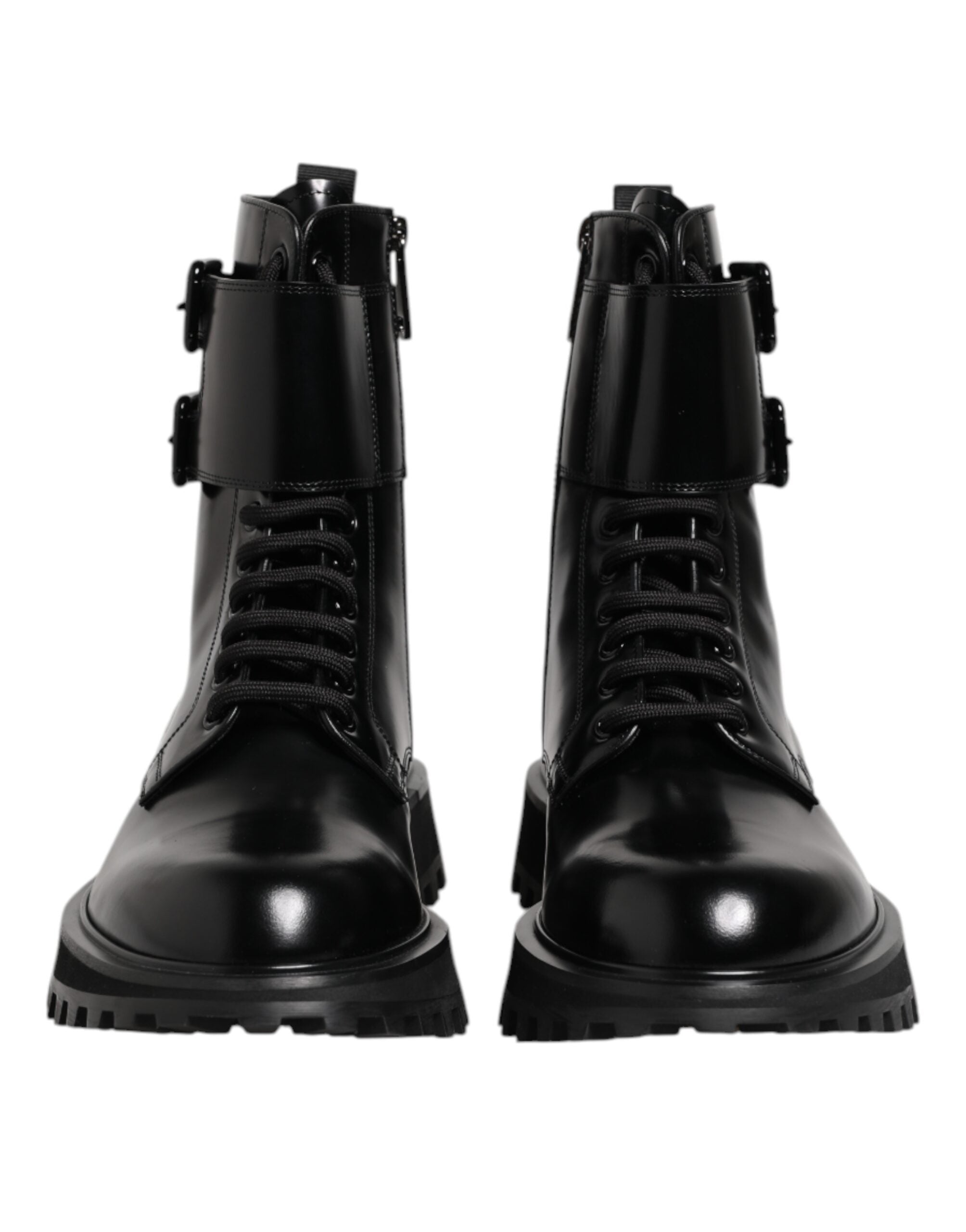 Step into a realm of sophistication with Dolce & Gabbana's Black Leather Lace Up Mid Calf Boots, where exquisite craftsmanship meets timeless elegance for the discerning individual.