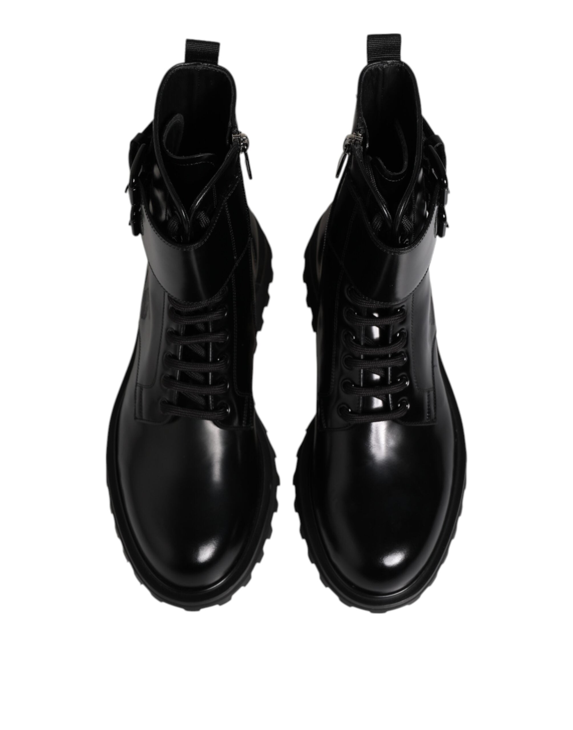Elevate your style with Dolce & Gabbana's Black Leather Lace Up Mid Calf Boots, a harmonious blend of exquisite craftsmanship and timeless elegance, perfect for any sophisticated occasion.