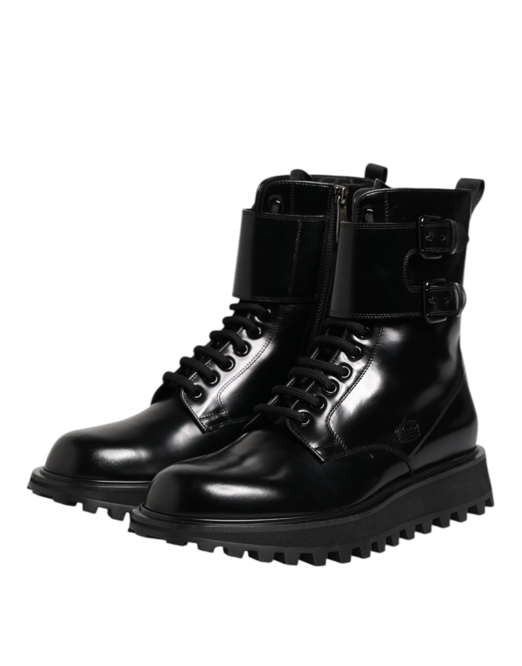 Indulge in the exquisite Dolce & Gabbana Black Leather Lace Up Mid Calf Boots, where luxurious calf leather meets artisanal craftsmanship for timeless elegance.