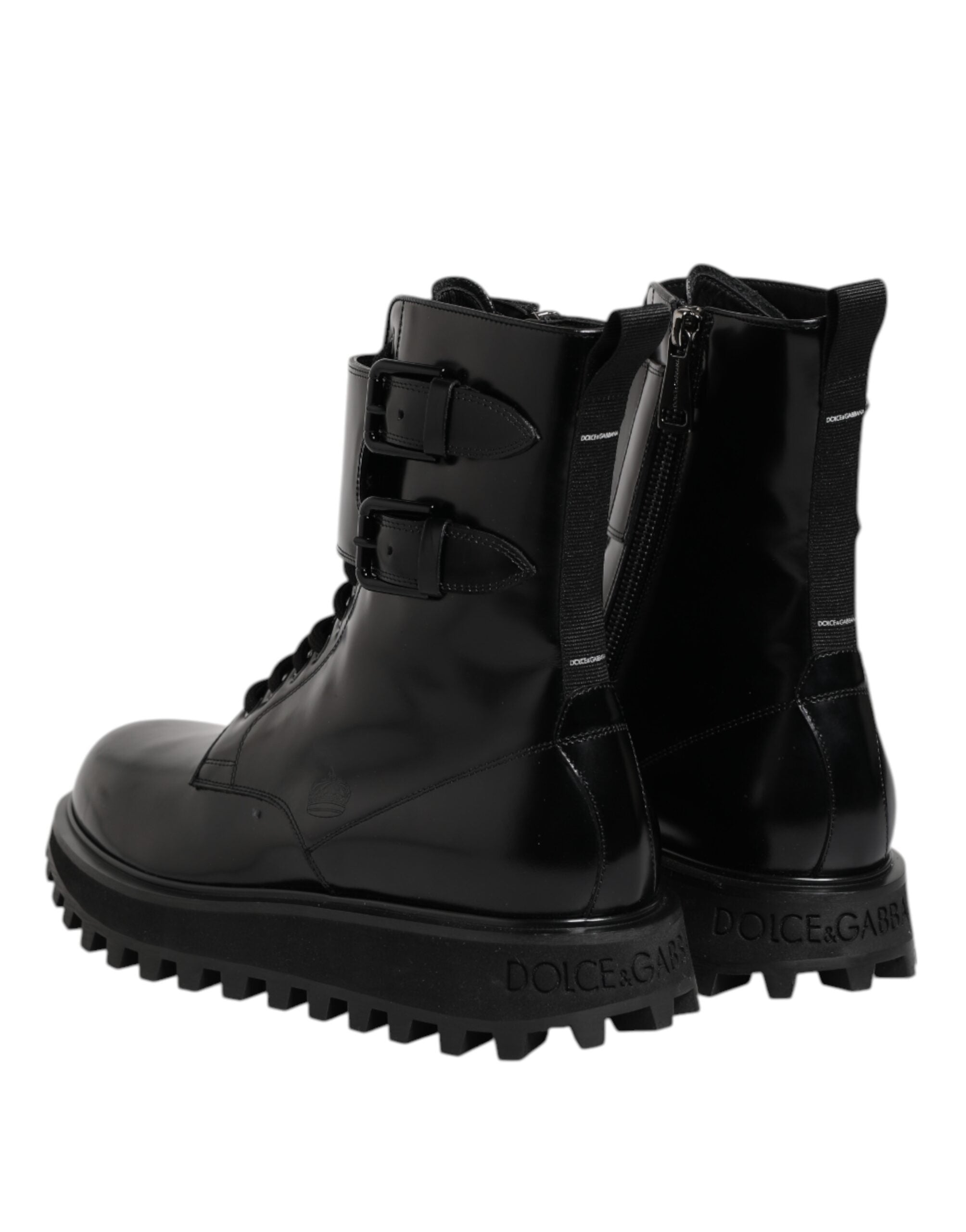 Experience the allure of Dolce & Gabbana's Black Leather Lace Up Mid Calf Boots, where exquisite craftsmanship meets timeless elegance, perfect for the discerning connoisseur.