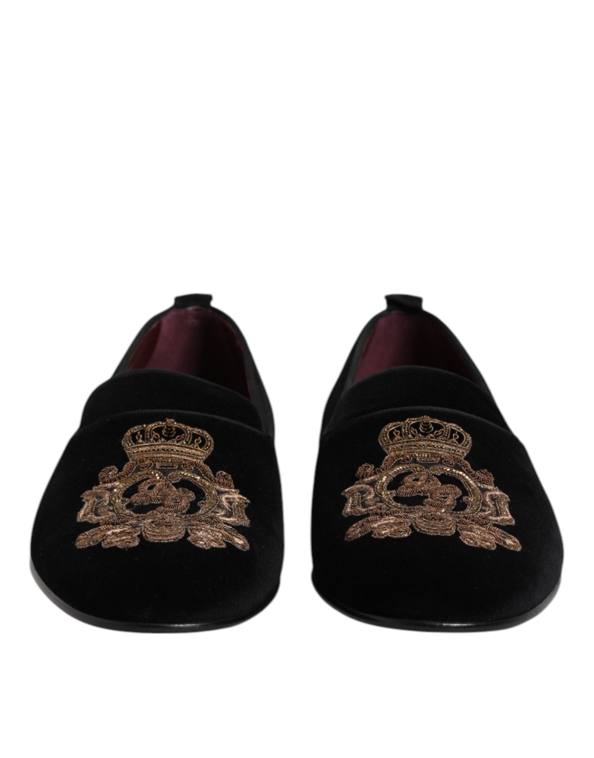 Indulge in the exquisite allure of Dolce & Gabbana's Black Velvet Gold Crown Loafers, where Italian craftsmanship meets opulent design, perfect for the discerning connoisseur.