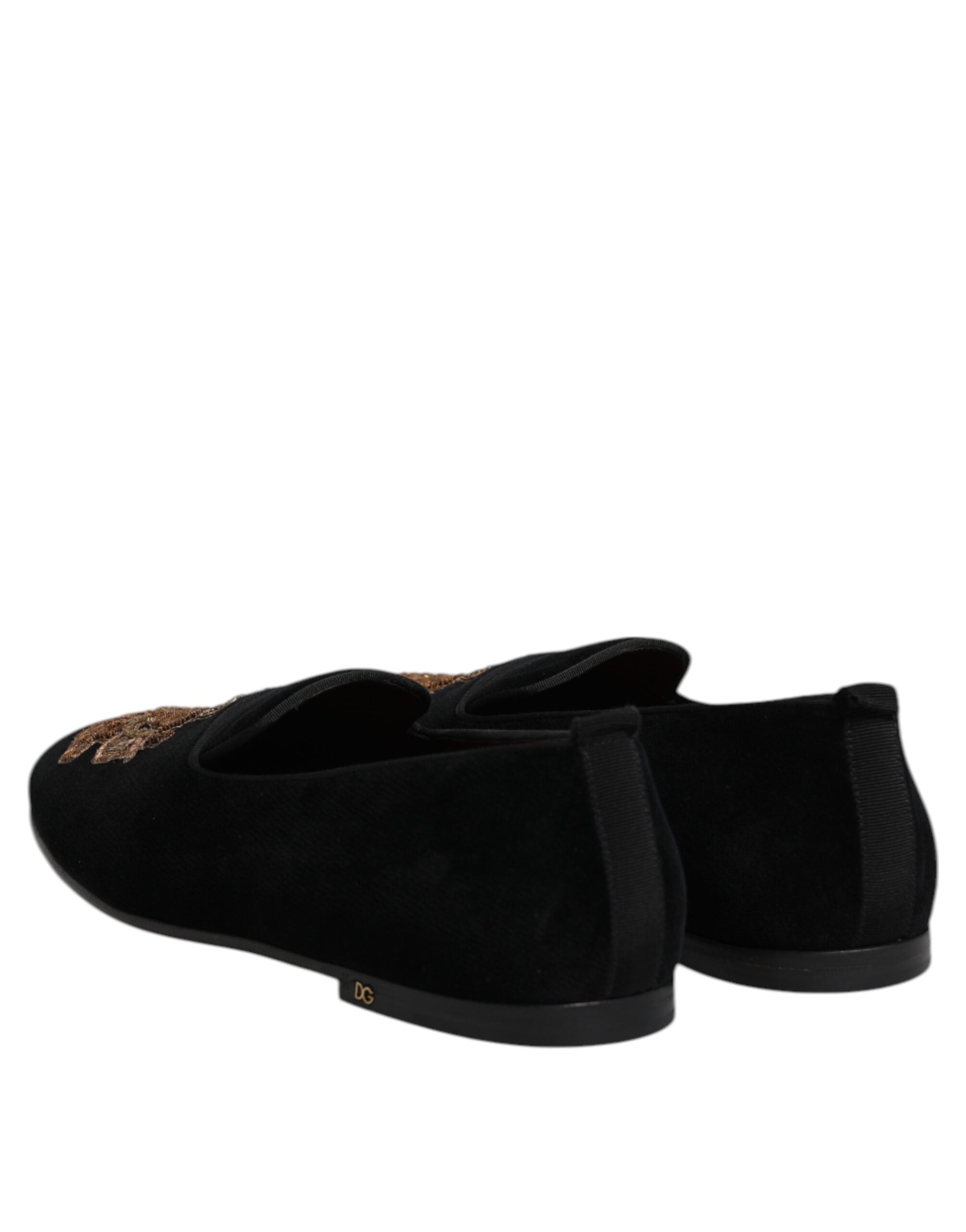 Indulge in the exquisite allure of Dolce & Gabbana Black Velvet Gold Crown Mens Loafers, where Italian craftsmanship meets luxurious comfort, elevating every occasion.