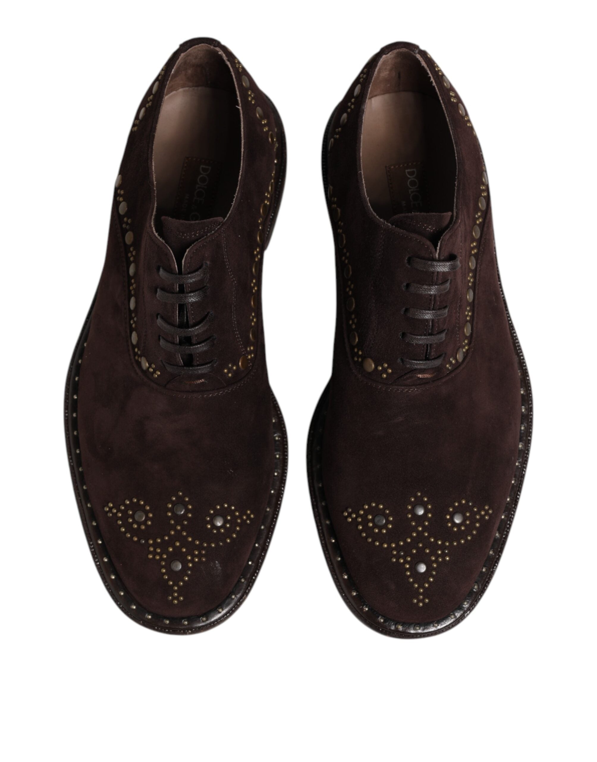 Step into a realm of opulence with Dolce & Gabbana's Brown Velvet Lace Up Oxford Dress Shoes, where exquisite craftsmanship meets timeless elegance for the discerning individual.